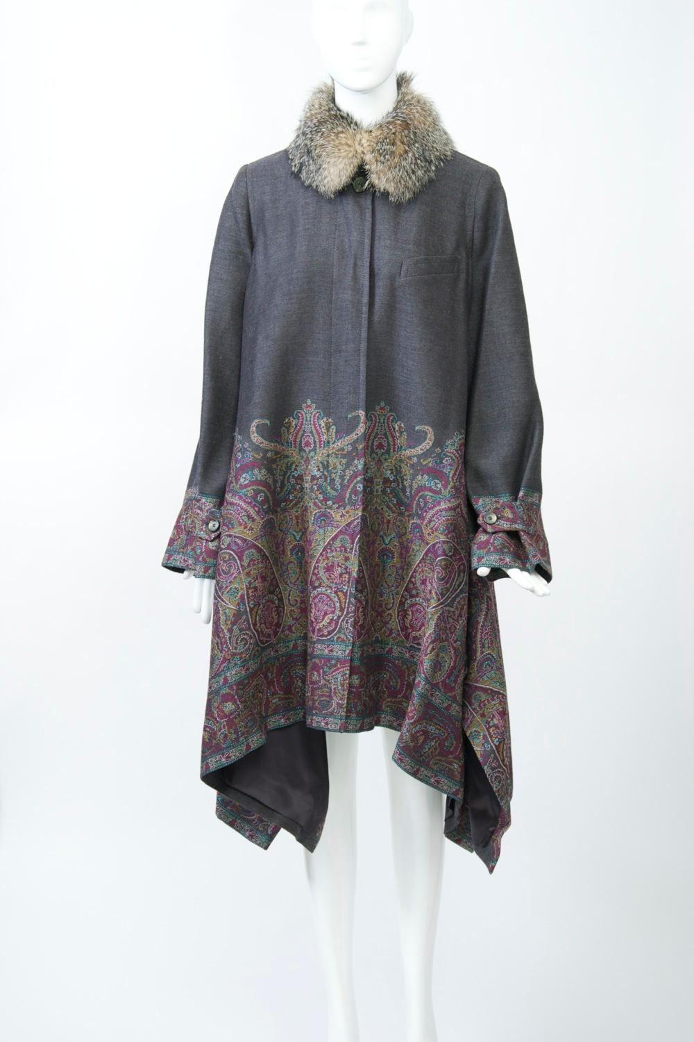 Etro coat in a charcoal gray wool blend featuring a multicolored paisley design on the bottom half of the body and around the wrists of the sleeves, along with a silver fox collar (which can be removed, as there is a regular collar underneath). A
