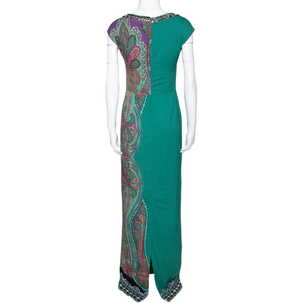 Etro has designed this maxi dress to light up your days in style. Carrying paisley prints and beads, this dress features a V neckline and a floor-length hemline. The beautiful creation is complete with a back zipper.

Includes: Price Tag