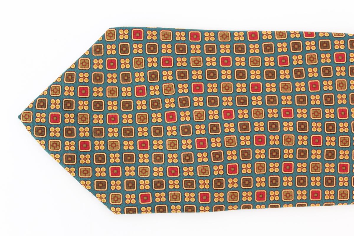 Etro classic geometric vintage 90s tie. Green and red, 100% silk. Made in Italy.

Length: 144 cm
Width: 9 cm