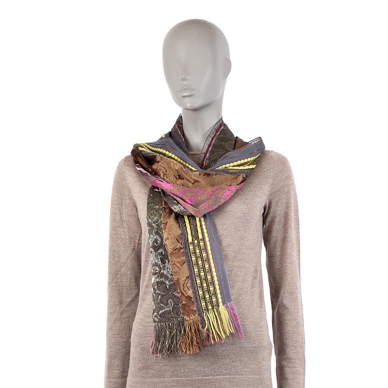 Etro ethnic shawl in wool (36%), acetate (25%), silk (14%), polyester (13%), acrylic (10%), viscose (9%), alpaca (2%) and nylon (1%). The base is a purple-grey chiffon with wooden and embroidered details in yellow, bronze, pink, blue and metallic