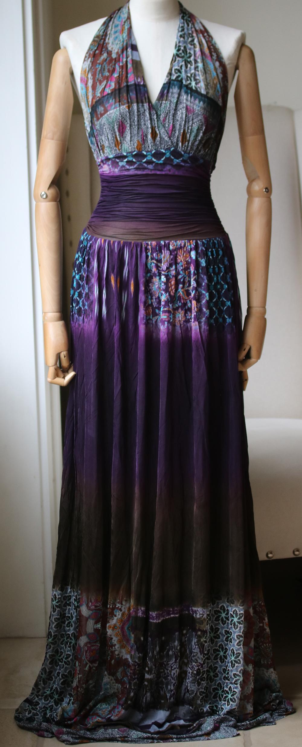 Etro draws on their traditional Italian roots when designing their collections - from shaping to prints, the bohemian-inspired brand continues to create retro-influenced pieces with a modern twist. This purple halter printed maxi dress from Etro