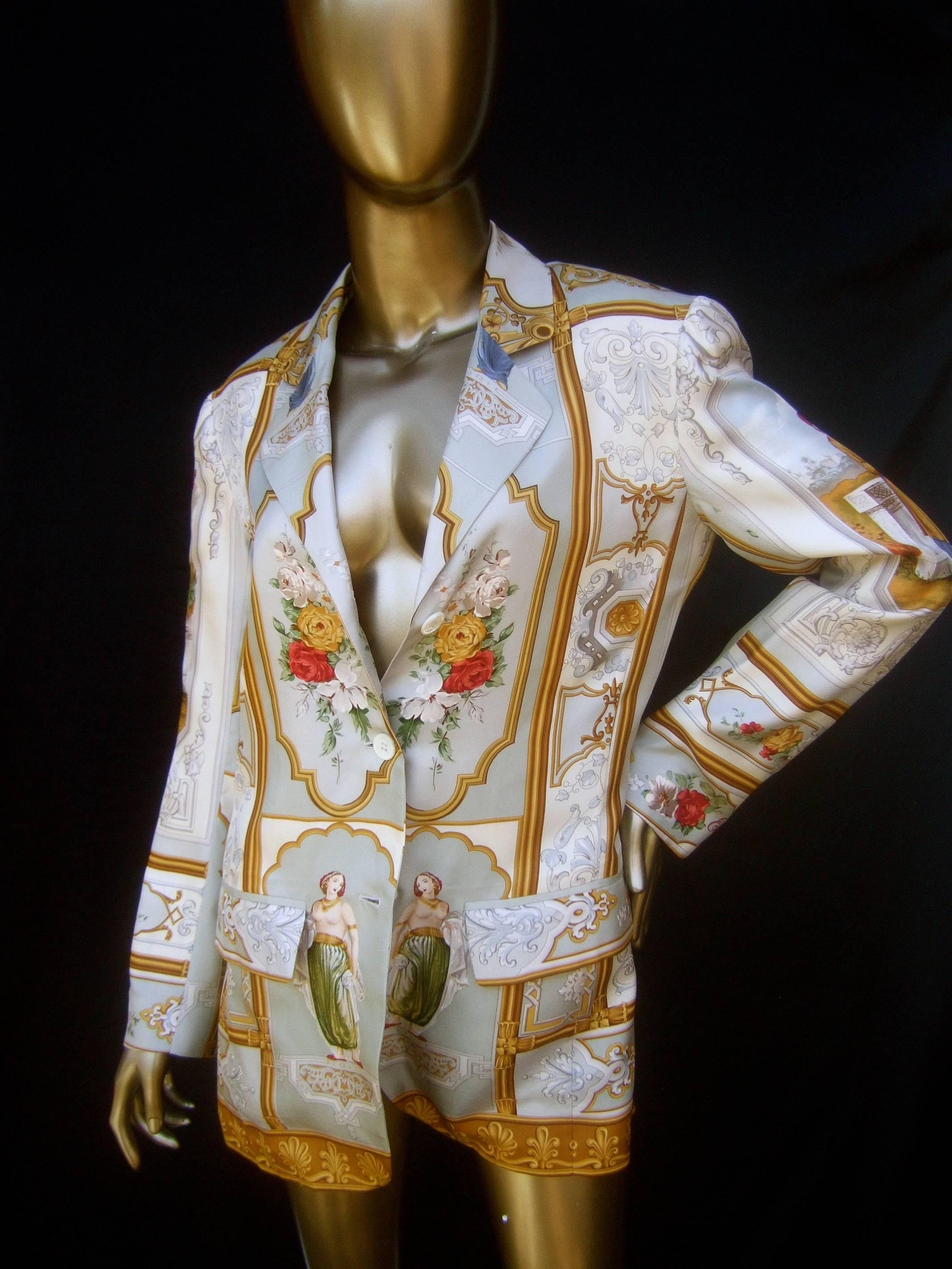 Etro Italian luxurious silk graphic print jacket Size 40 
The elegant designer silk jacket is illustrated 
with ornate gilded frame style graphics 

The front of the jacket features a pair of elegant
woman. The midsection of the jacket is