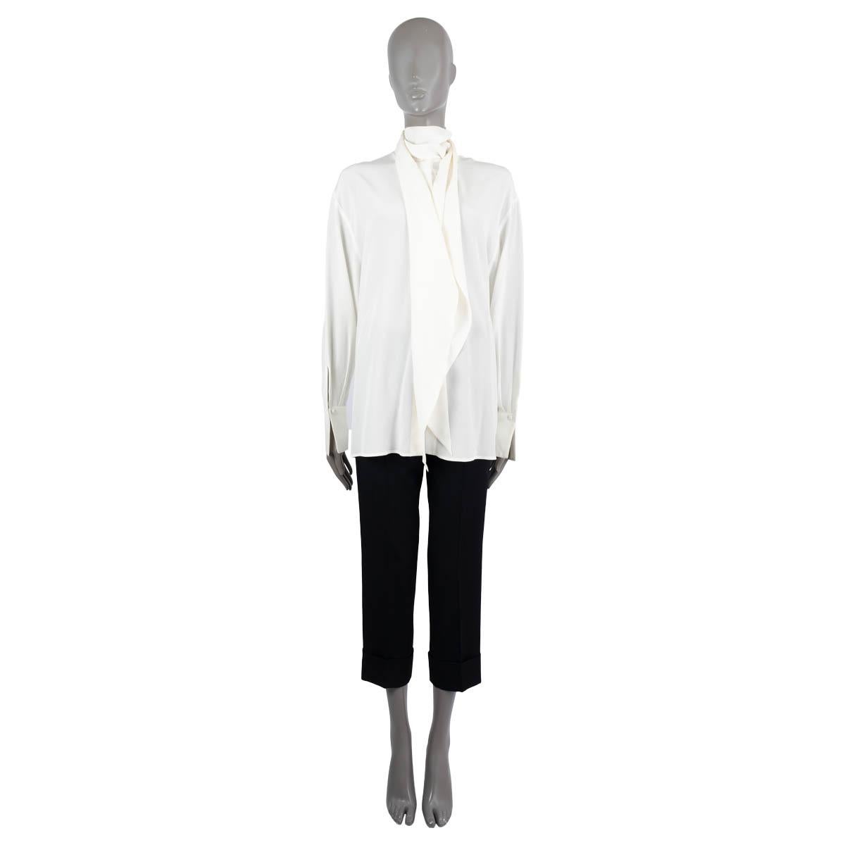 100% authentic Etro Santa Barbara blouse in white silk (100%). Featuring a flowing draped tie-neck and oversized cuffs. Closes with concealed buttons on the front. Excellent condition.

Measurements
Tag Size	44
Size	L
Shoulder Width	53cm