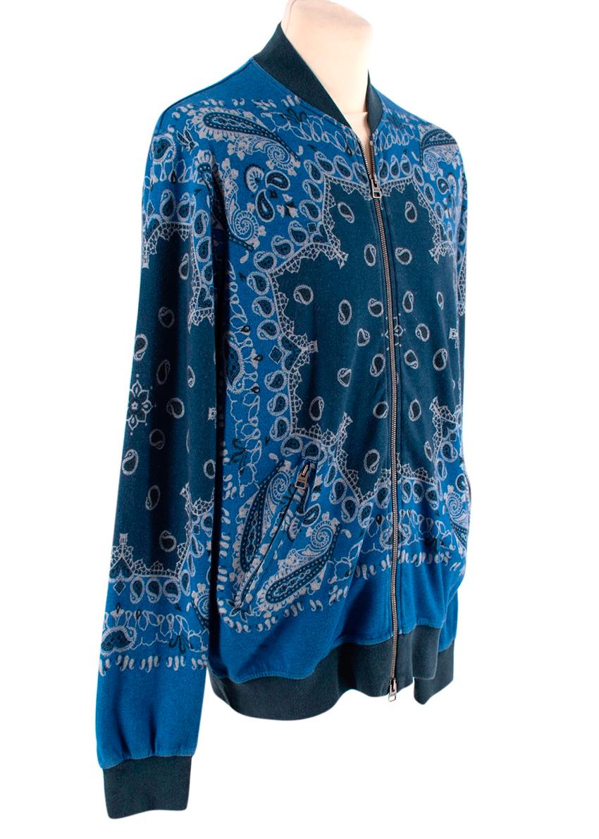 Etro Long Sleeve Blue Paisley Bomber Jacket 
 

 Blue hues long sleeve paisley print bomber jacket from 
 

 -ETRO featuring a round neck
 -Long sleeves
 -An elasticated hem
 -Elasticated cuffs
 -A front zip fastening 
 -Paisley print
 -Two front