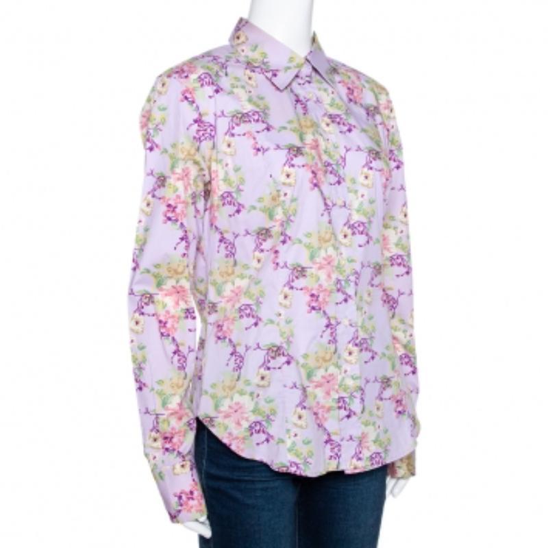 Elegante e femminile, questa camicia di Etro è perfetta per le giornate casual. Realizzato in cotone, presenta una tonalità malva e una stampa floreale. Ha una silhouette aderente, maniche lunghe, colletto e bottoni sul davanti. Si abbinerà bene a
