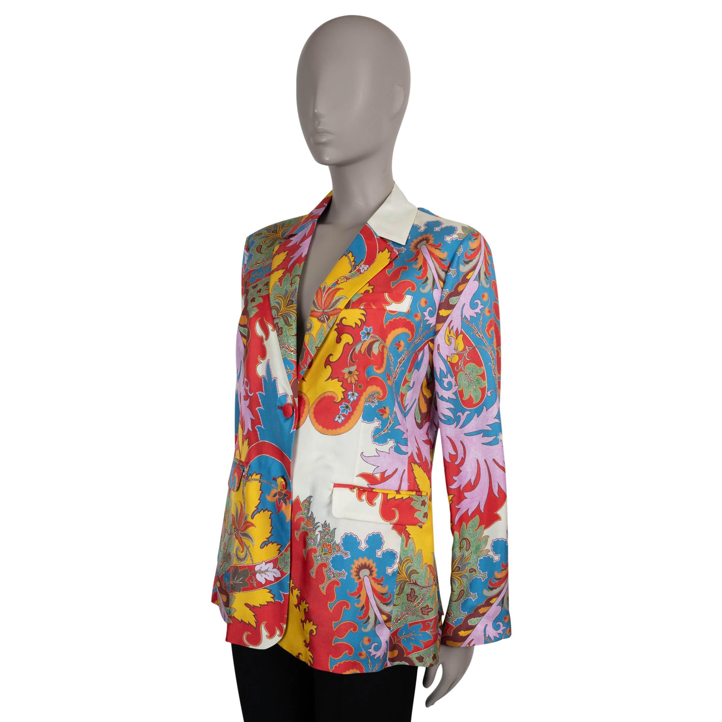 This 100% authentic Etro blazer in multicolored Blooming Paisley printed silk (100%) is a vibrant statement piece that blends tailoring with artistic flair. Designed with a relaxed yet fitted silhouette, it features classic notched lapels,