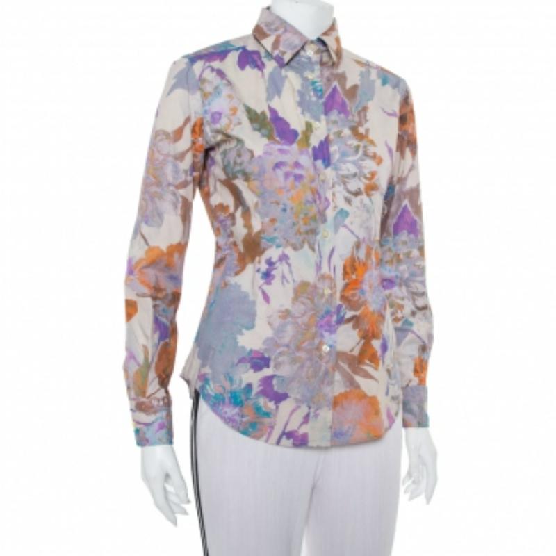 This brightly designed floral shirt from Etro will add liveliness to your everyday look. Cut out from cotton, the beautiful multicolored shirt has a smart silhouette, front button closure, and long sleeves. Complete your look by pairing it with