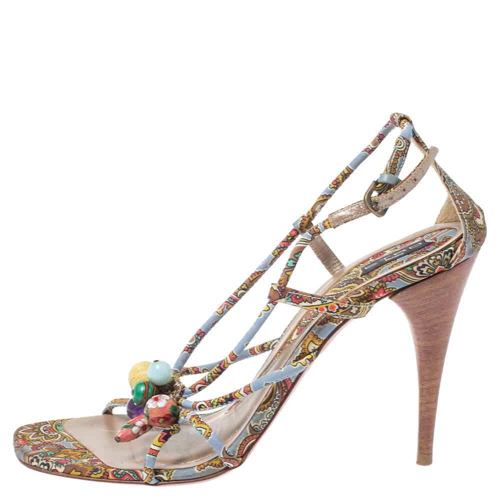 Creations from Etro have forever impressed us and they continue to do so! These lovely multicolor sandals are crafted from paisley printed fabric and styled in an open-toe strappy silhouette with bead embellishments. They flaunt ankle straps with