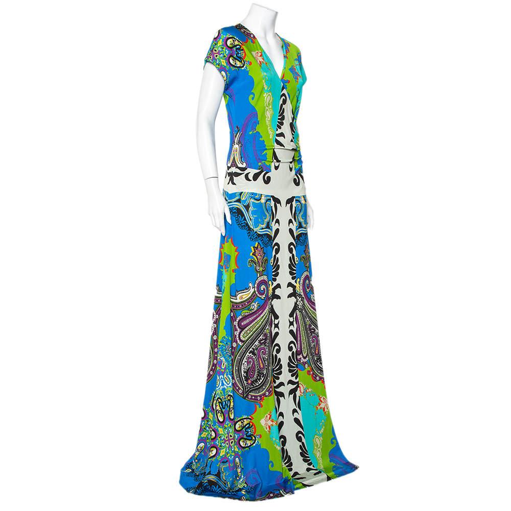 This dress is beautified with a faux wrap silhouette and gorgeous prints. This Etro maxi dress, when accessorized well, will look great for evening outings. The pleasing outfit is complete with short sleeves and a plunging neckline.