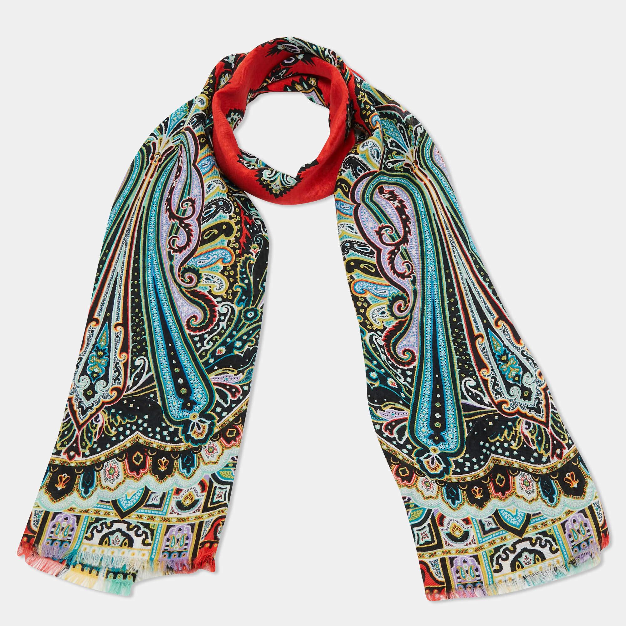 Style this Etro stole gently around your neck for a luxe finish. It is made of a cashmere blend and covered in signature paisley prints.

Includes: Price Tag