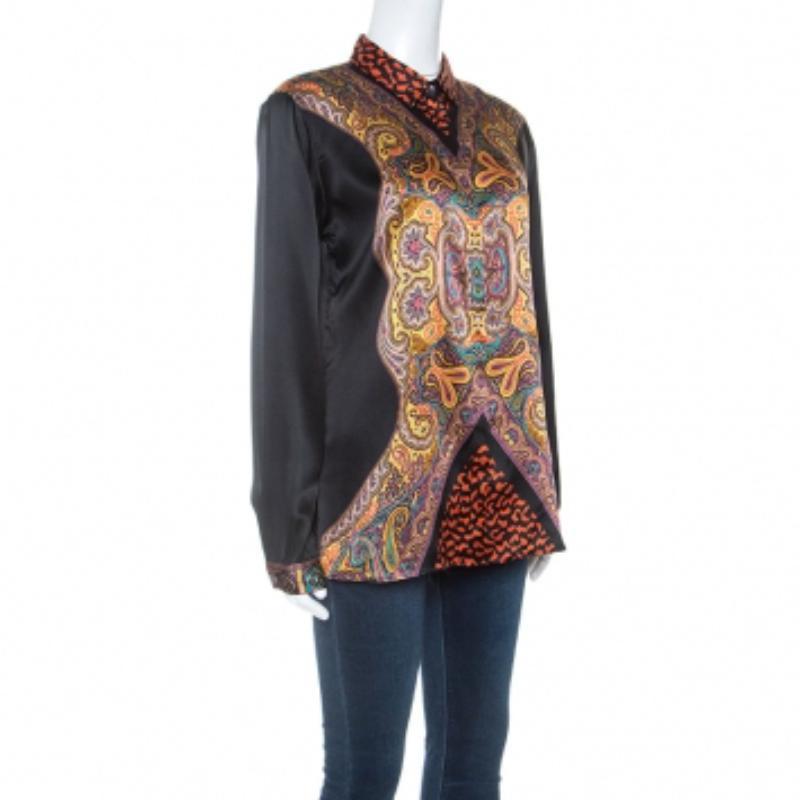 Etro brings to you this uncommon and stylish shirt that can be paired with almost anything in your dresser. The smart use of multicoloured fabric in this top attracts attention and demands all eyes on you. It has a simple collar, button front and