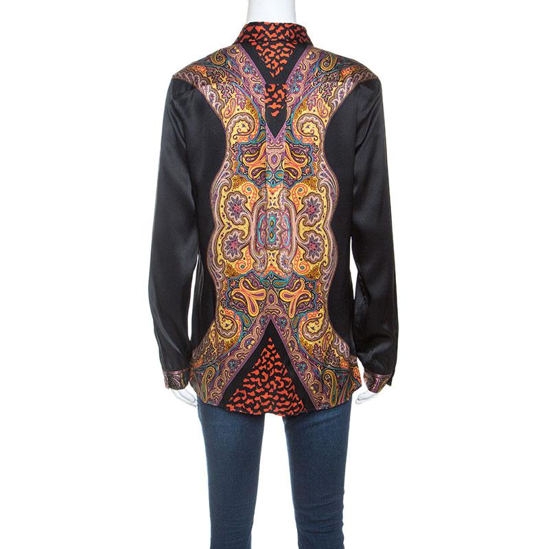 Etro brings to you this uncommon and stylish shirt that can be paired with almost anything in your dresser. The smart use of multicoloured fabric in this top attracts attention and demands all eyes on you. It has a simple collar, button front and