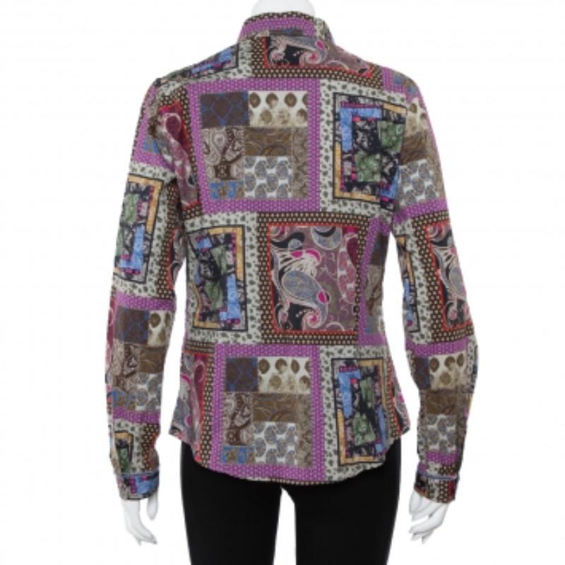 To complement your groovy style, Etro presents this paisley printed shirt adorned with cuff and collars. This long-sleeved shirt will ensure a comfortable fit as it is cut from cotton. Featuring a button front closure, this shirt will go well with