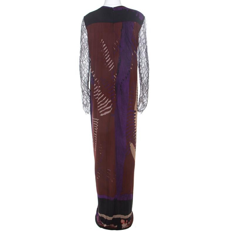 How gorgeous is this sleeveless maxi dress from Etro! The multicolored dress is made of quality fabrics and features a lovely silhouette. It flaunts an interesting abstract print all over and comes with a round neckline and long lace sleeves. It can