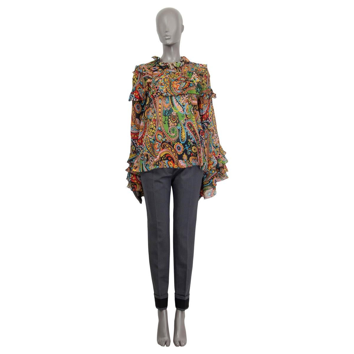100% authentic Etro Fall/Winter 2021 'California' semi sheer blouse in green, pink, blue, red, yellow and back silk (100%). Features flared cuffs, ruffled details and a paisley print. Opens with a button on the back. Unlined. Has been worn and is in
