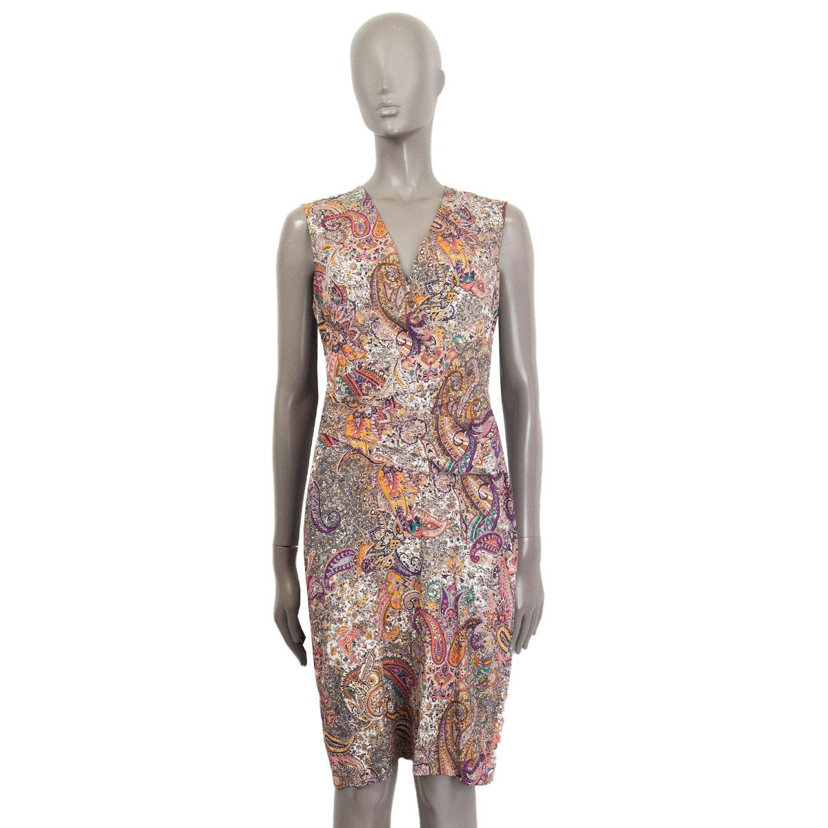 100% authentic Etro sleeveless draped paisley dress in taupe, olive, green, orange, pink, magenta, black, petrol, mustard silk (94%) and elastane (6%) with a v neck-line and draped around the waistline. Closes with a hook and a concealed zipper on