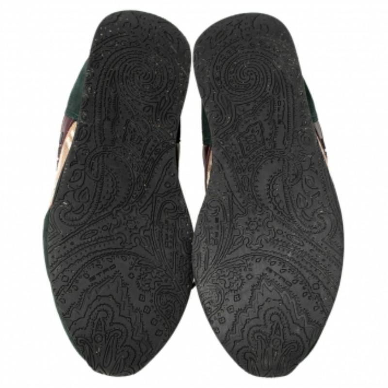 The distinct look of these sneakers from Etro is created with brocade fabric, finished off with suede and leather trims, lace ups, and brand detailing on the sides. They are a fine pair to uplift or complement your off-duty adventures.
