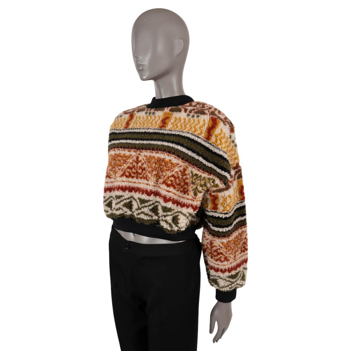 100% authentic Etro multicolour teddy jacquard cropped jumper in wool (22%) and polyester (78%) featuring high neck, long sleeves and elasticated black cuffs. Brand new. 

2021 Fal/Winter

Measurements
Tag Size	40
Size	S
Shoulder Width	60cm