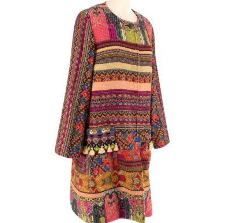 Etro Multicolour Embroidered Embellished Coat

- Made of luxurious multicoloured embroidered cotton.
- Swing style
- embellished with tassles
- Button closure
- 2 exterior pockets. 

Made in Italy. 
Do not wash.
Condition 9.5/10 - Small tear to the
