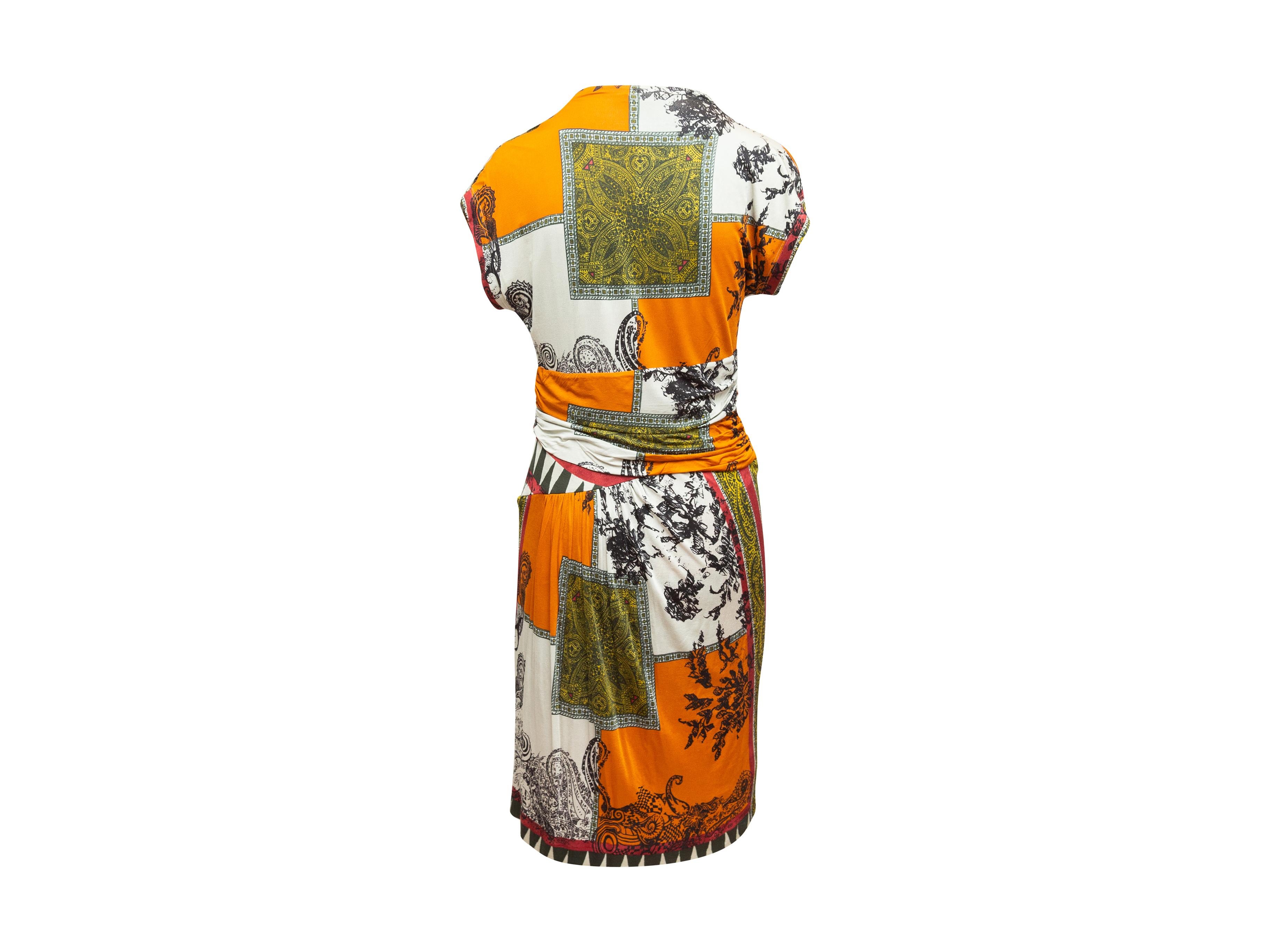 Product details: Orange and multicolor abstract print dress by Etro. Short sleeves. Surplice neckline. Designer size 48. 36