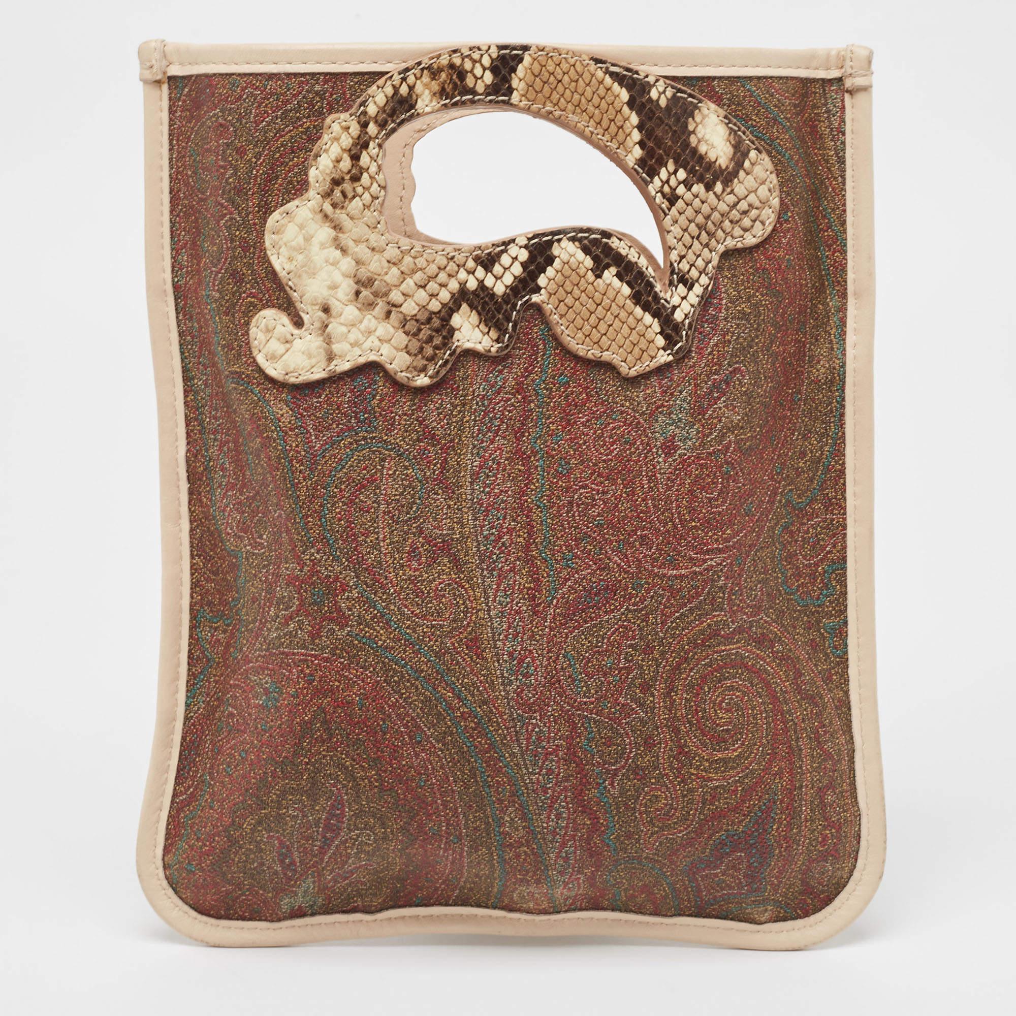 A beautiful and stylish bag to wear through the day or dress up for the day parties, this Etro crossbody bag can fit your basic essentials with ease. Crafted in brown paisley printed coated canvas, this bag is accented with beige leather trimming