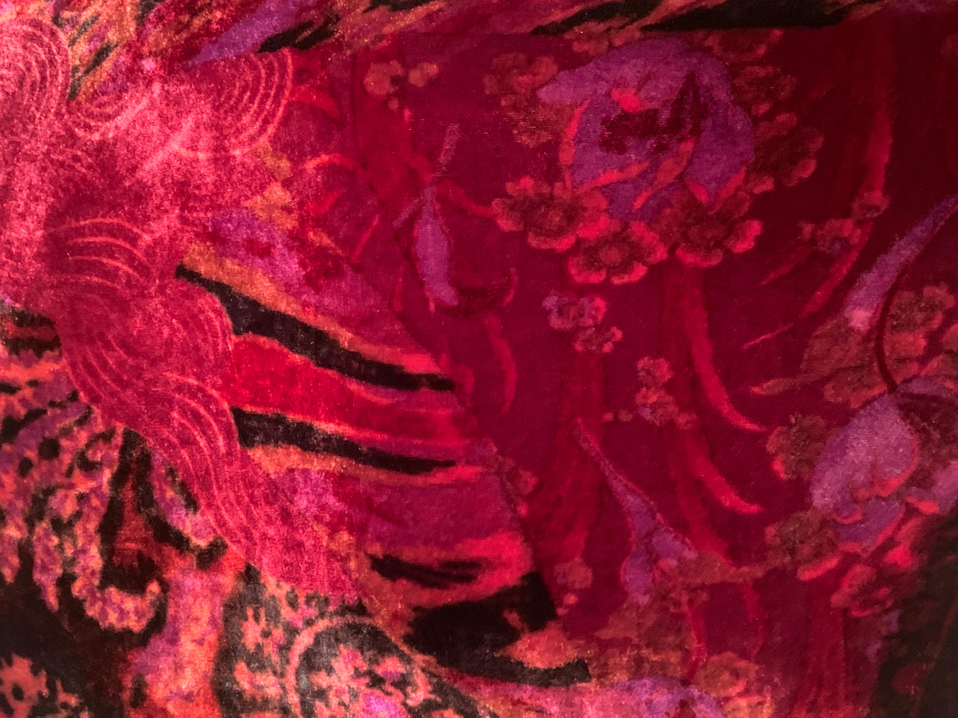 This gorgeous Etro shawl is reversible, one side is a beautiful contemporary paisley design on silk velvet in lush shades of burgundy, purple and black. The more subdued side of the shawl is made from black cashmere. It is in excellent condition.