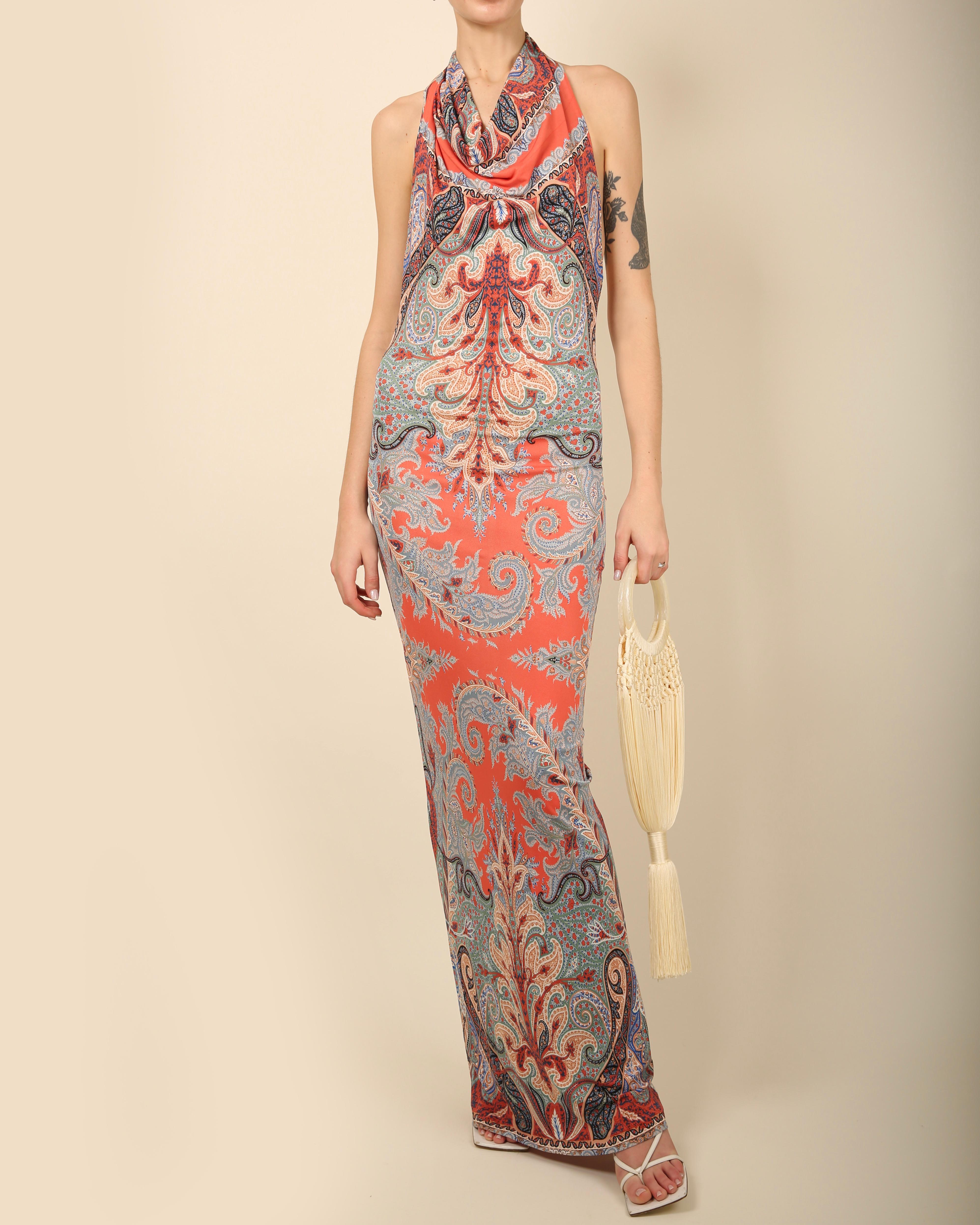 Etro paisley print floor length dress from the S/S 2014 runway collection
Halter neck cut with a draped neckline 
Body con stretch fit
Backless
Colours consist of red, blue, green, black and white

Size:
IT 40 with plenty of