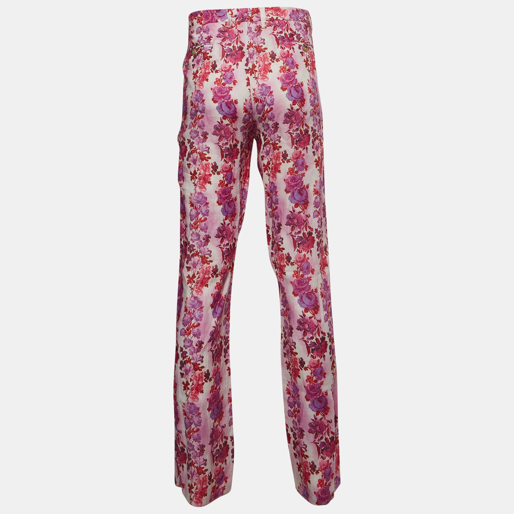 Crafted with care, the Etro pants exude charm and comfort. Delicate pink blooms dance across breathable linen, offering a graceful touch. Tailored to perfection, these pants boast a straight fit, ensuring both style and ease. Embrace timeless