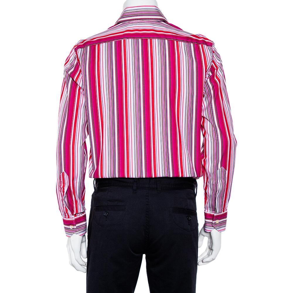 Lend a classic touch to casual looks with this cotton shirt from Etro. It is designed with a striped pattern all over in the shades of pink. The long sleeves, a classic collar, and button placket neatly complete the design. Wear it with plain