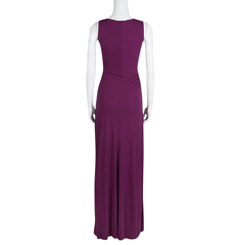Etro's maxi dress is perfect for those glamorous evenings. The sleeveless style features a purple knit construct with a draped waistline that beautifully defines the figure. The embellished detailing add a glamorous touch to the dress. Complete the