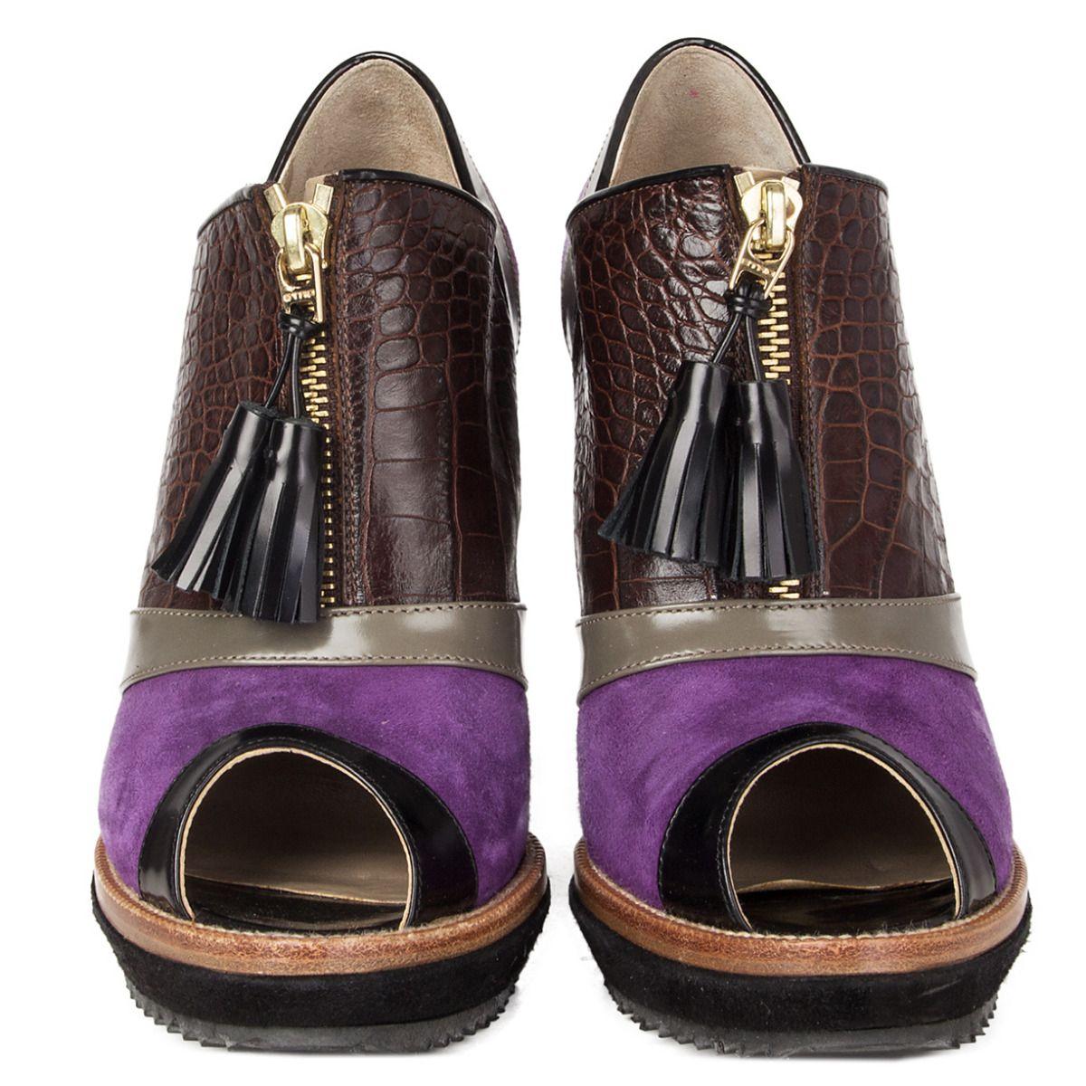 100% authentic Etro booties in purple suede, brown embossed croco leather, sage and black leather featuring black suede heel and platform. Open with zipper tassels. Have been worn once and are in virtually new condition. 

Measurements
Imprinted