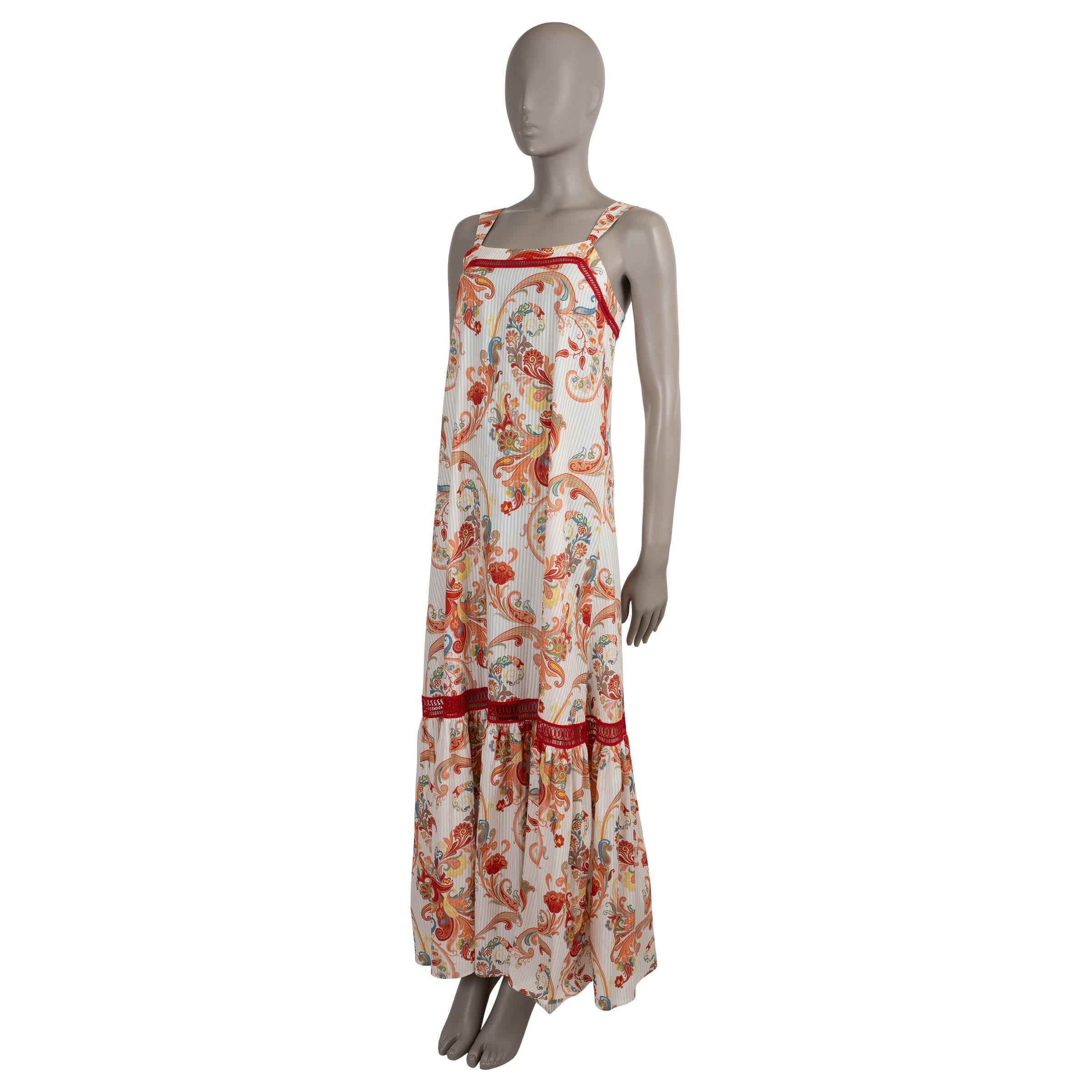 This 100% authentic Etro dress is crafted in white striped jacquard cotton (77%) and silk (23%), featuring the house’s signature paisley print in soft peach, red, and multicolored tones. Designed with a relaxed, A-line silhouette and maxi length, it