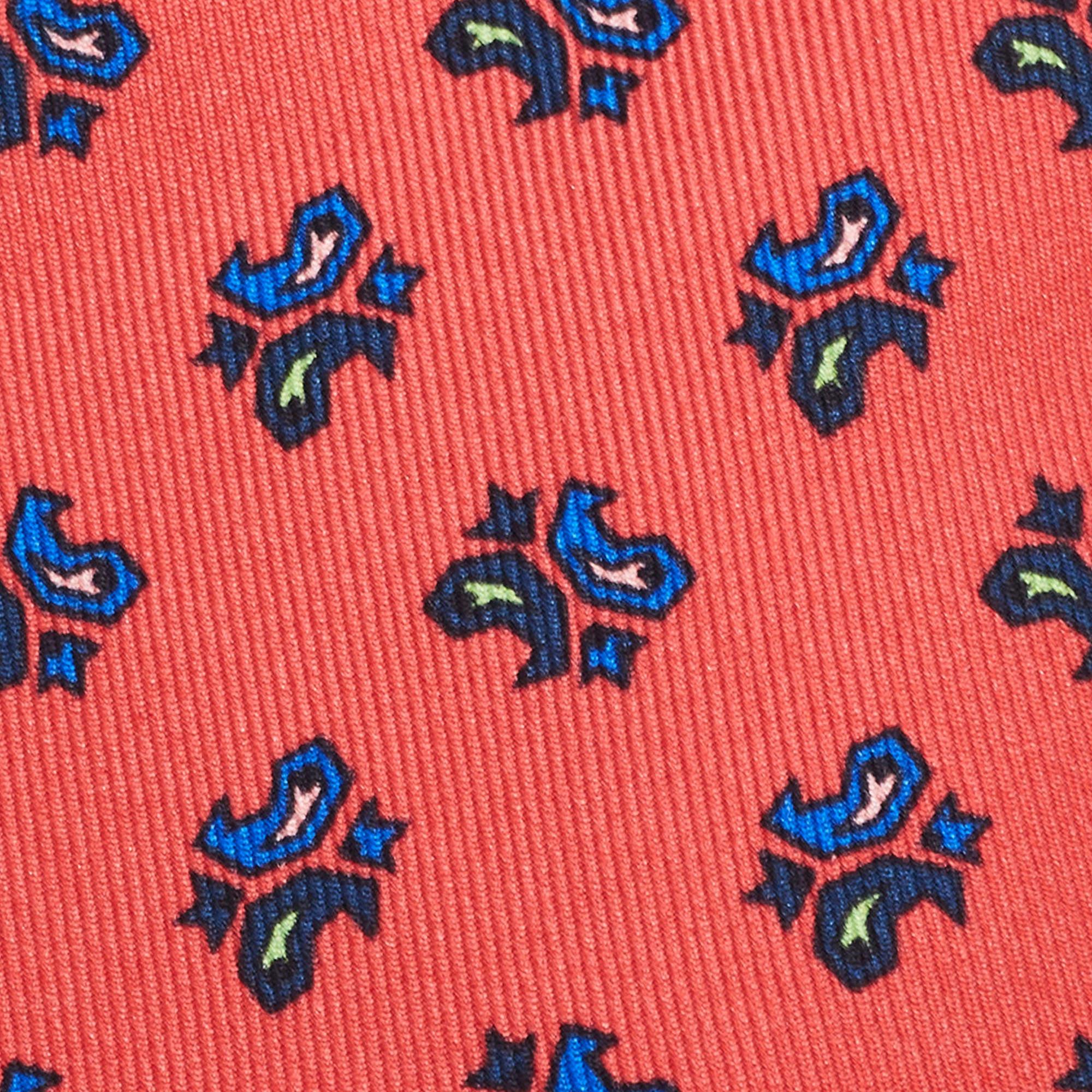 This tie is a perfect formal accessory that has a sharp and modern appeal. Made from luxurious materials  it features intricate patterns  and the brand label neatly stitched at the back. It is sure to add oodles of style to your blazers.