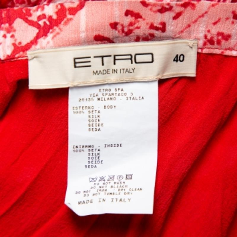 Flaunt your stylish best with this chic yet elegant Etro skirt. Celebrate the arrival of summer by wearing this silk tiered mini skirt in a bright red hue.