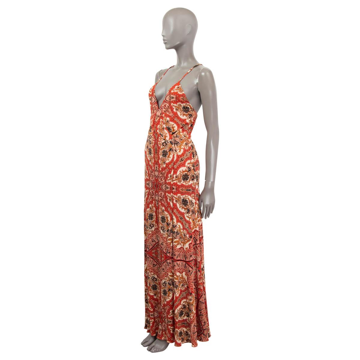 100% authentic Etro sleeveless paisley print maxi dress in rede, light salmon, black and brown viscose (100%) with spaghetti straps and criss-cross back. Opens with a zipper on the side and is lined in coral viscose (100%). Has been worn and is in