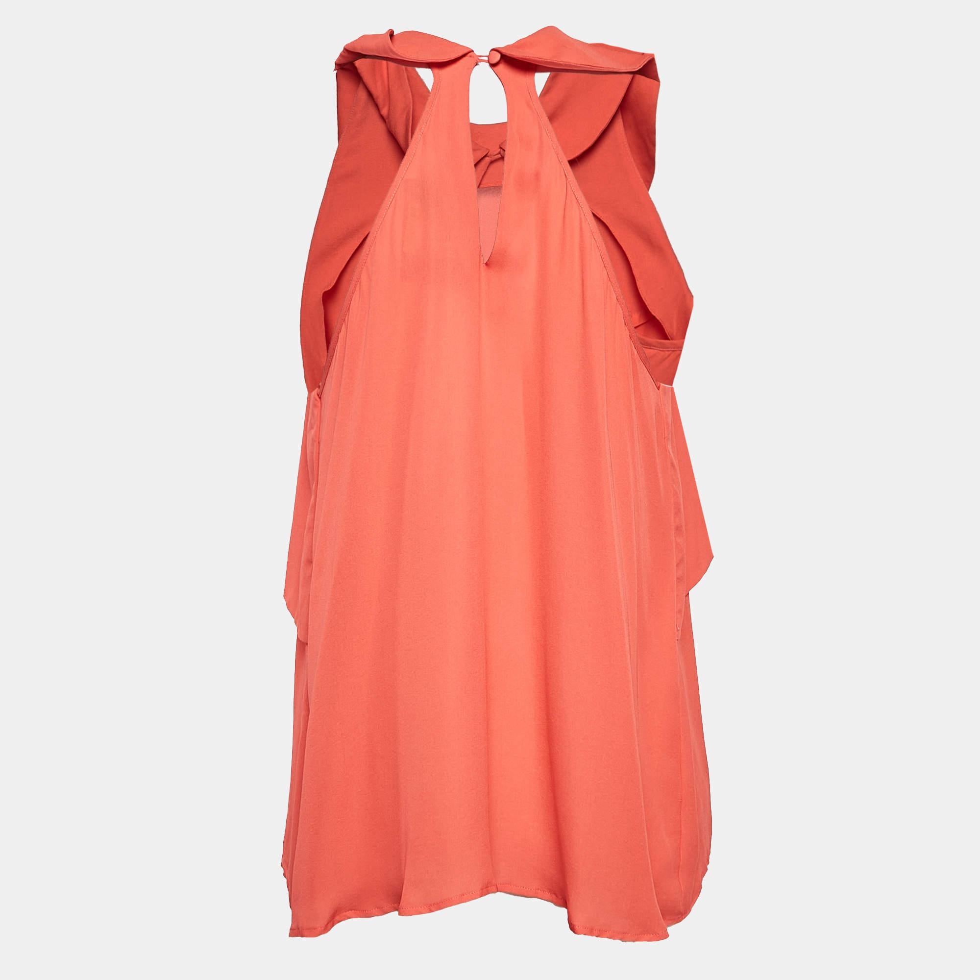 L'accurata sartoria, la seta di qualità e gli eleganti volant fanno di questo top rosso di Etro un pezzo da conservare. Il design è classico e facile da abbinare.