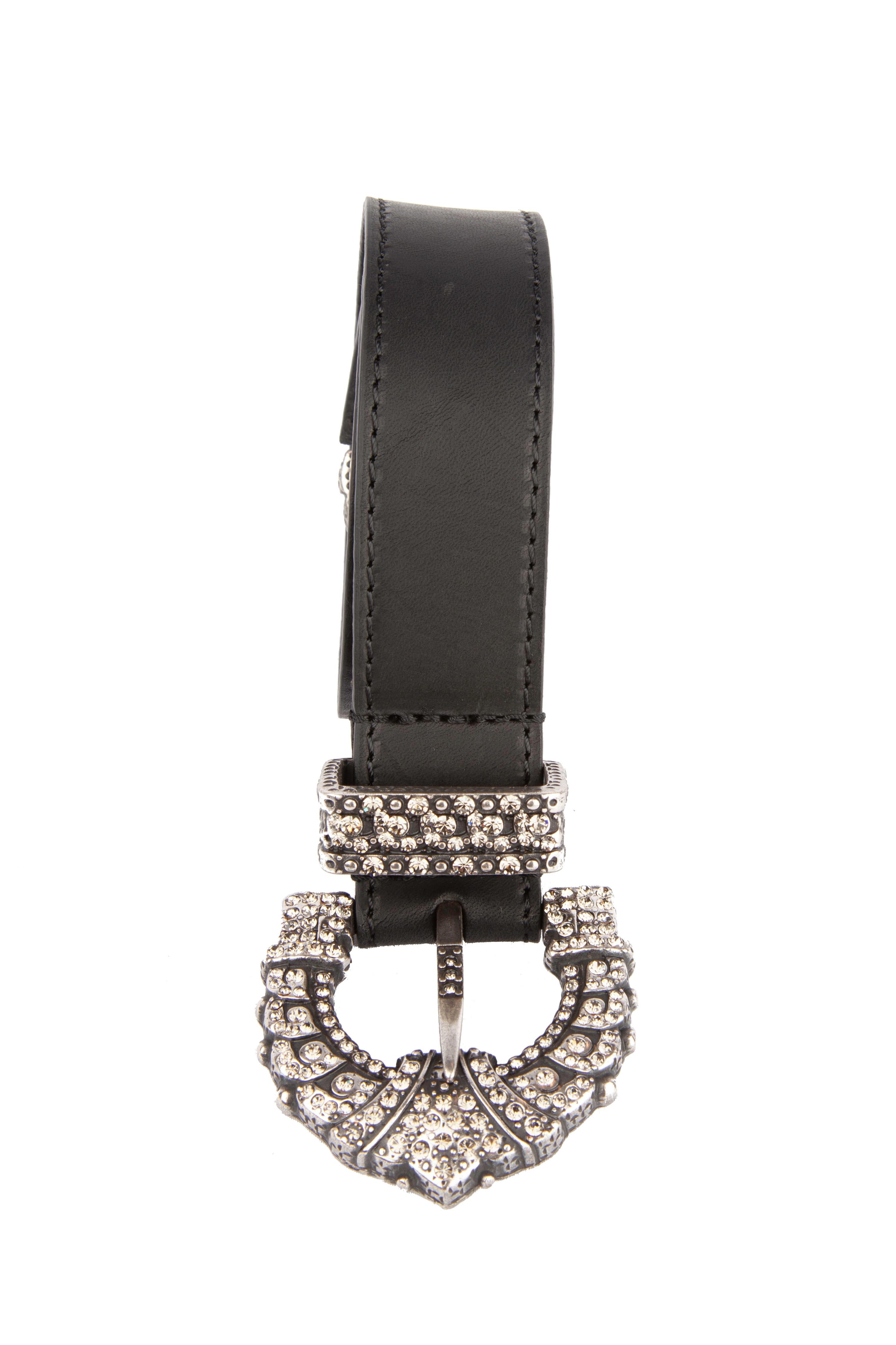This Etro Fall 2019 Runway black calf leather belt features an adjustable fit and crystal embellishments. Brand new. Made in Italy.

Size: 85

Material: Calf Leather