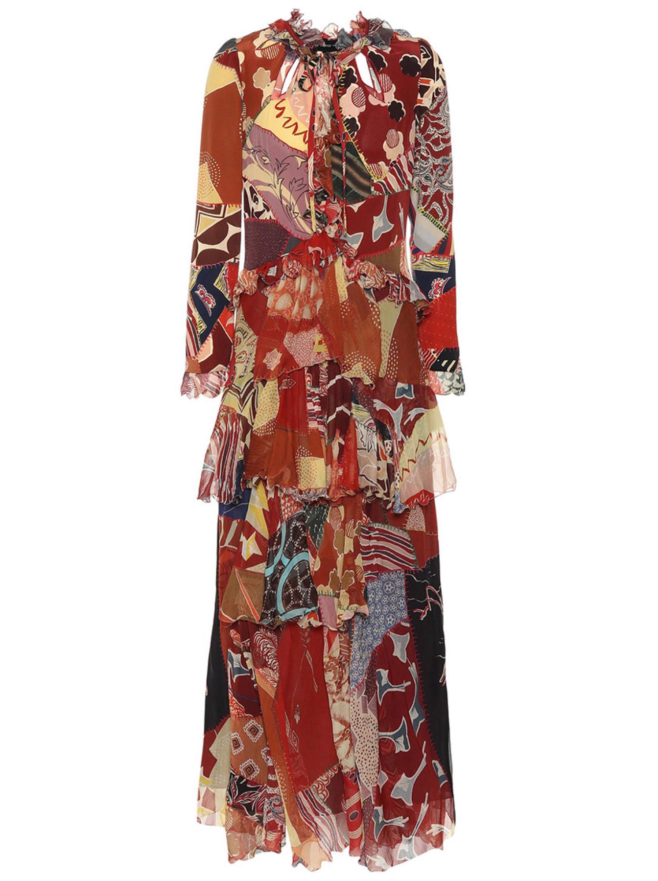 This Fall 2018 Runway Etro maxi dress features silk crêpe and crinkled chiffon material, a ruffled tiered silhouette, long sleeves, cutout details that are embroidered with red edges along the v-neck line, and a bold, colorful print. Brand new with