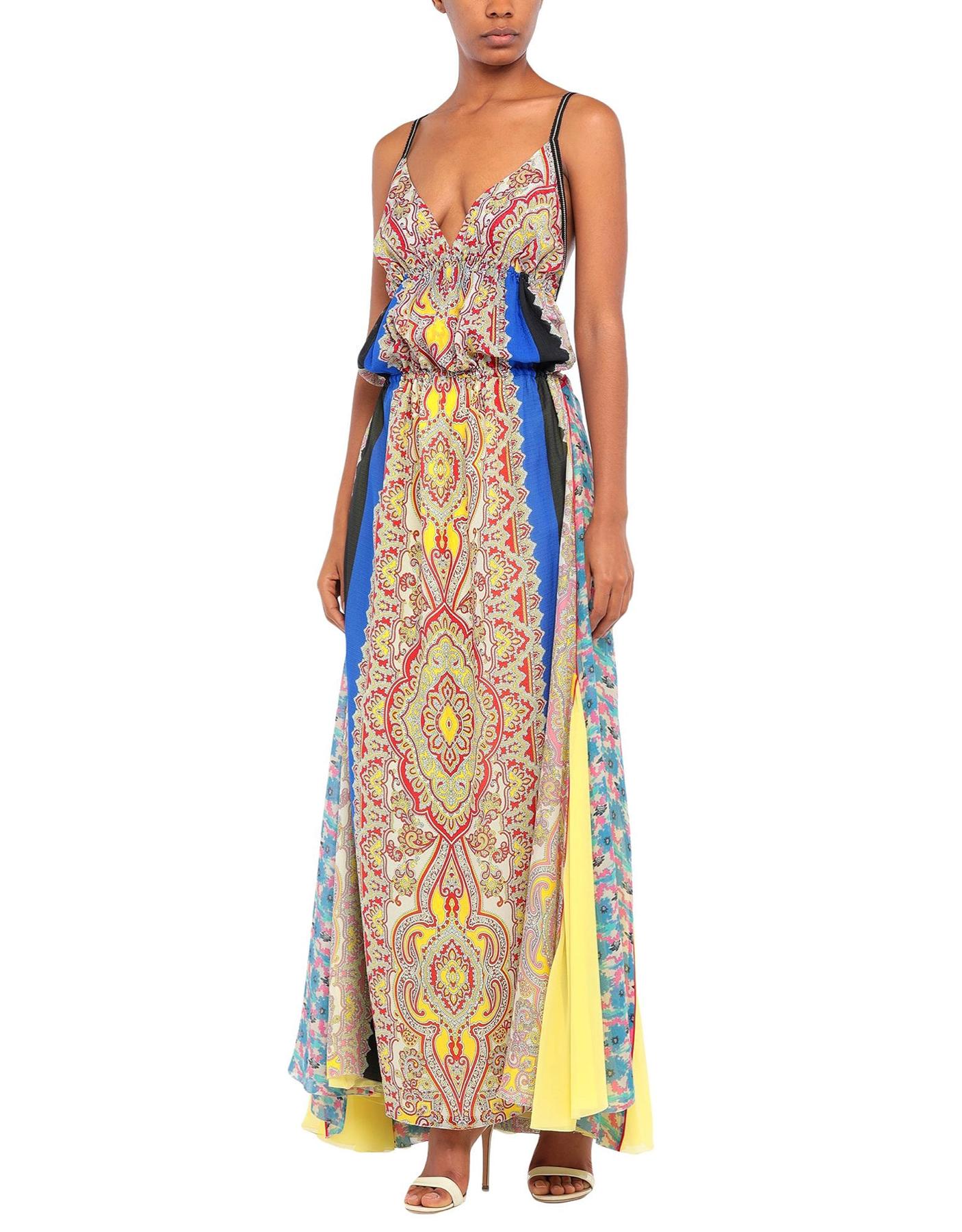 This Etro Spring 2019 Runway maxi dress features a flowing skirt, a silk outer composition, a colorful paisley print, and a wide V-neckline. Pair it with light colored sandals and layered necklaces to emulate a boho-chic look that Etro is famous