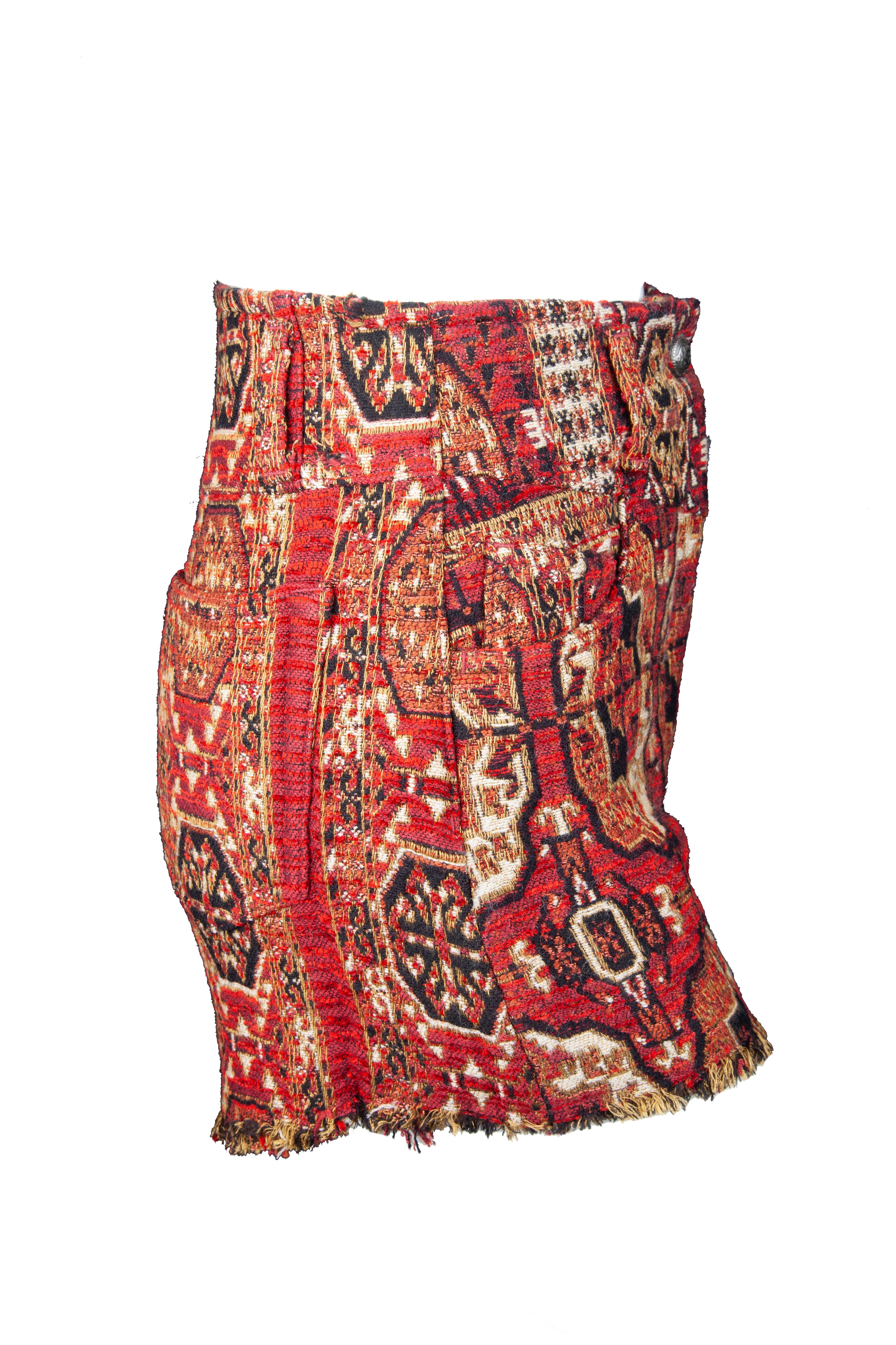 The Etro Fall 2019 Runway red shorts feature a jacquard tile print, a zipper/button closure, pockets, and a lightly fringed hem. Brand new with tags. Made in Italy.

Sizes Available: 26

Measurements :
Outer Length: 12.5 in
Total Length: 16