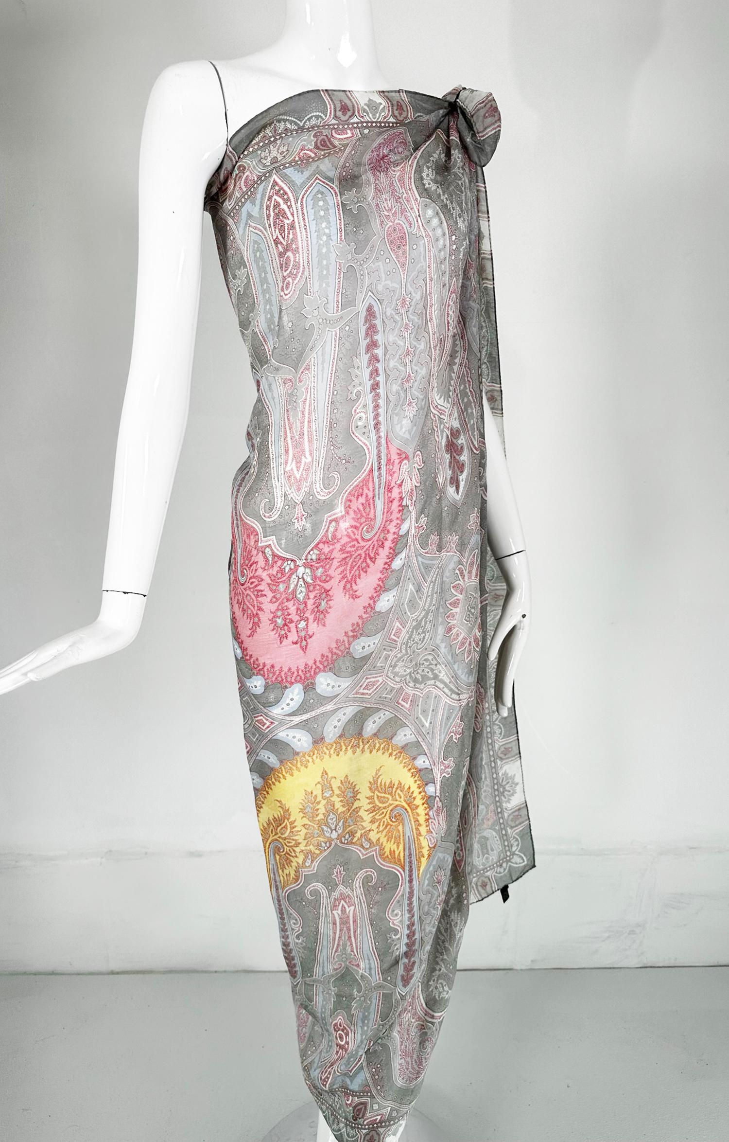Etro silk chiffon paisley shawl in greys, blues, yellows & pinks, large and perfect for wearing. Intricate paisley design a specialty of Etro in soft shades to wrap yourself up in. This beautiful scarf is sheer silk with a rolled edge, it's in