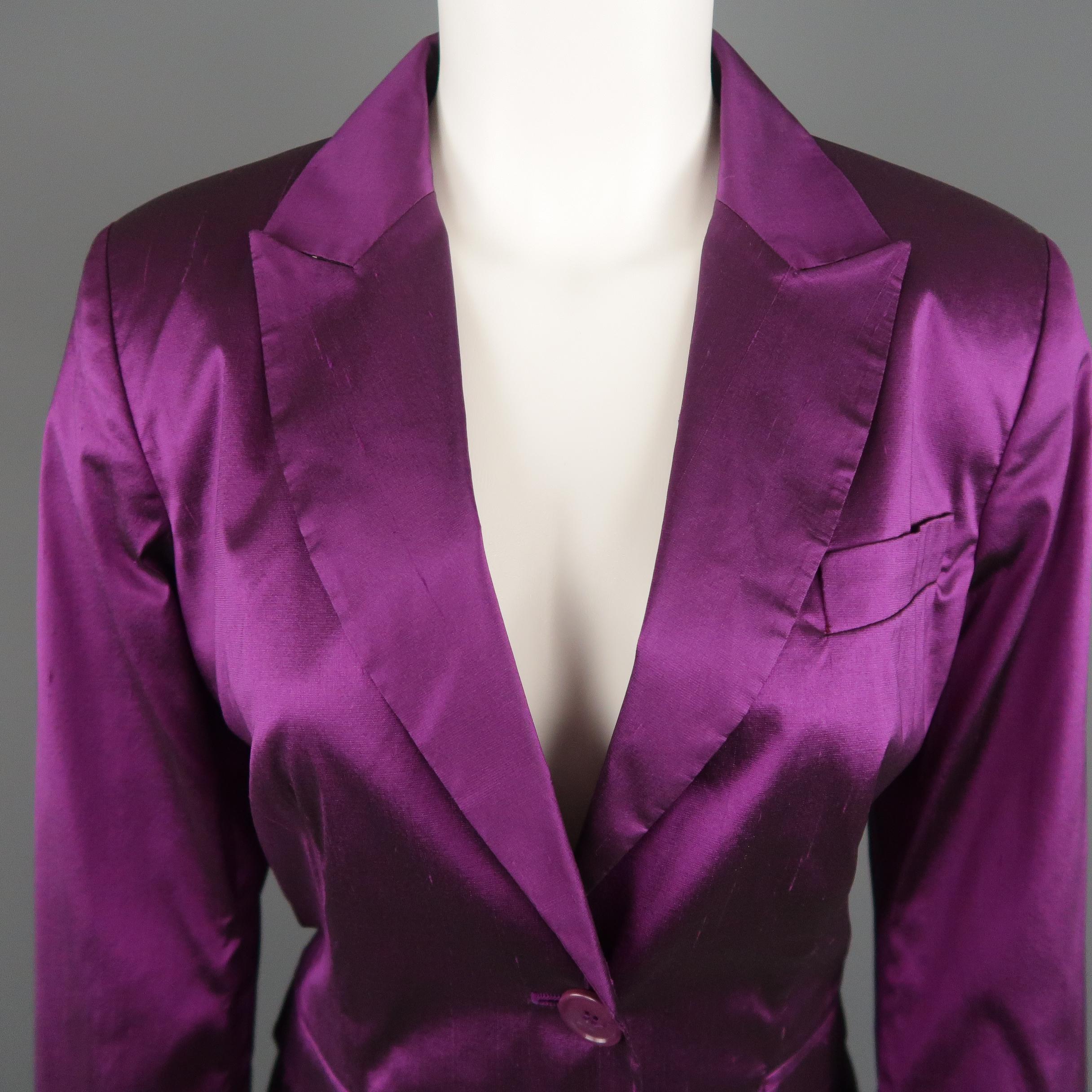 ETRO sport jacket comes in orchid purple silk blend Shantung textured taffeta with a peak lapel, single breasted, two button front, flap pockets, and half liner. Made in Italy.
 
Very Good Pre-Owned Condition.
Marked: IT 46
 
Measurements:
