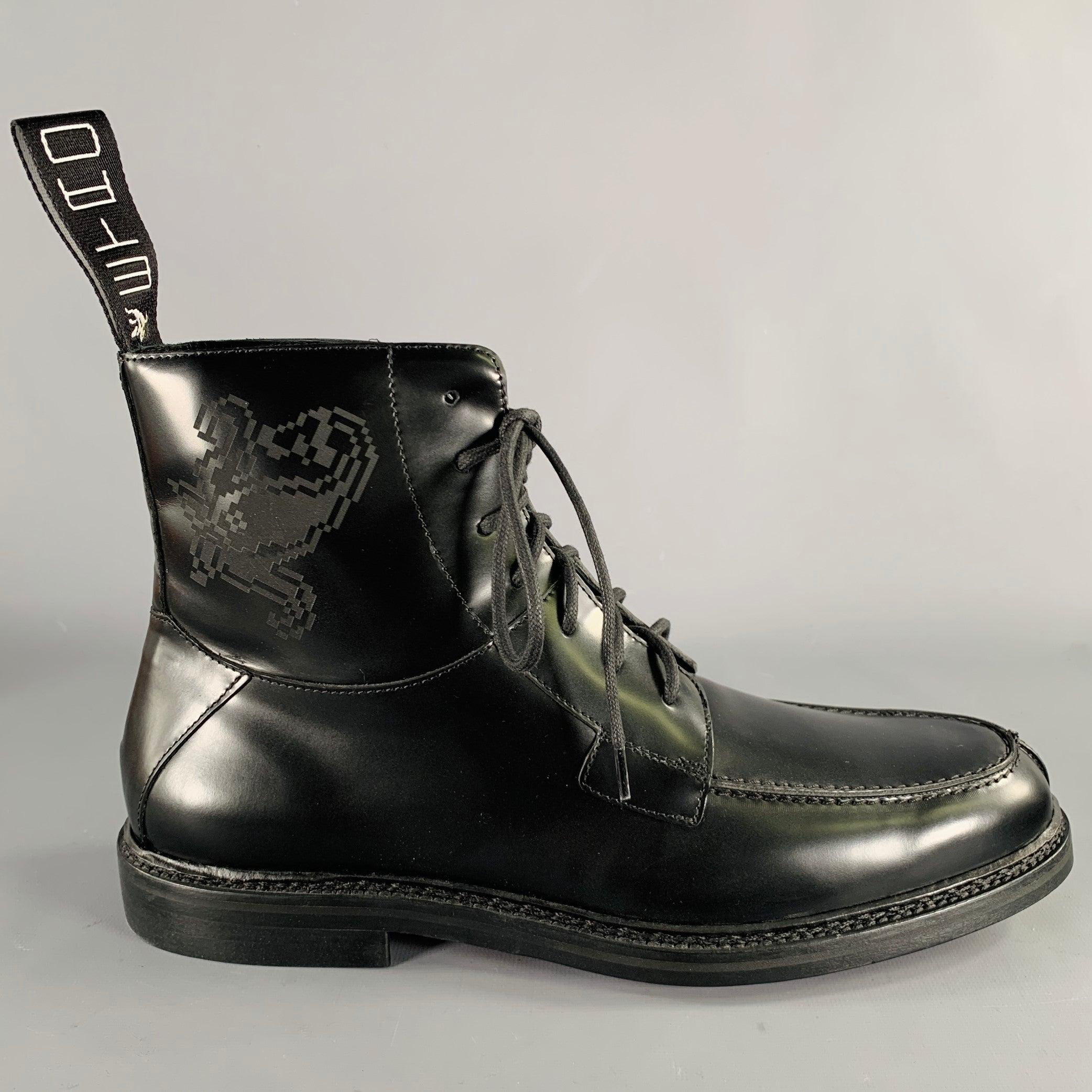 ETRO boots
in a black leather featuring pixel paisley accent on side, and lace-up closure. Comes with box and extra pair of orange laces. Made in Italy.New with Box. 

Marked:   EU 45 

Measurements: 
  Length: 12.5 inches Width: 4.5 inches Height: