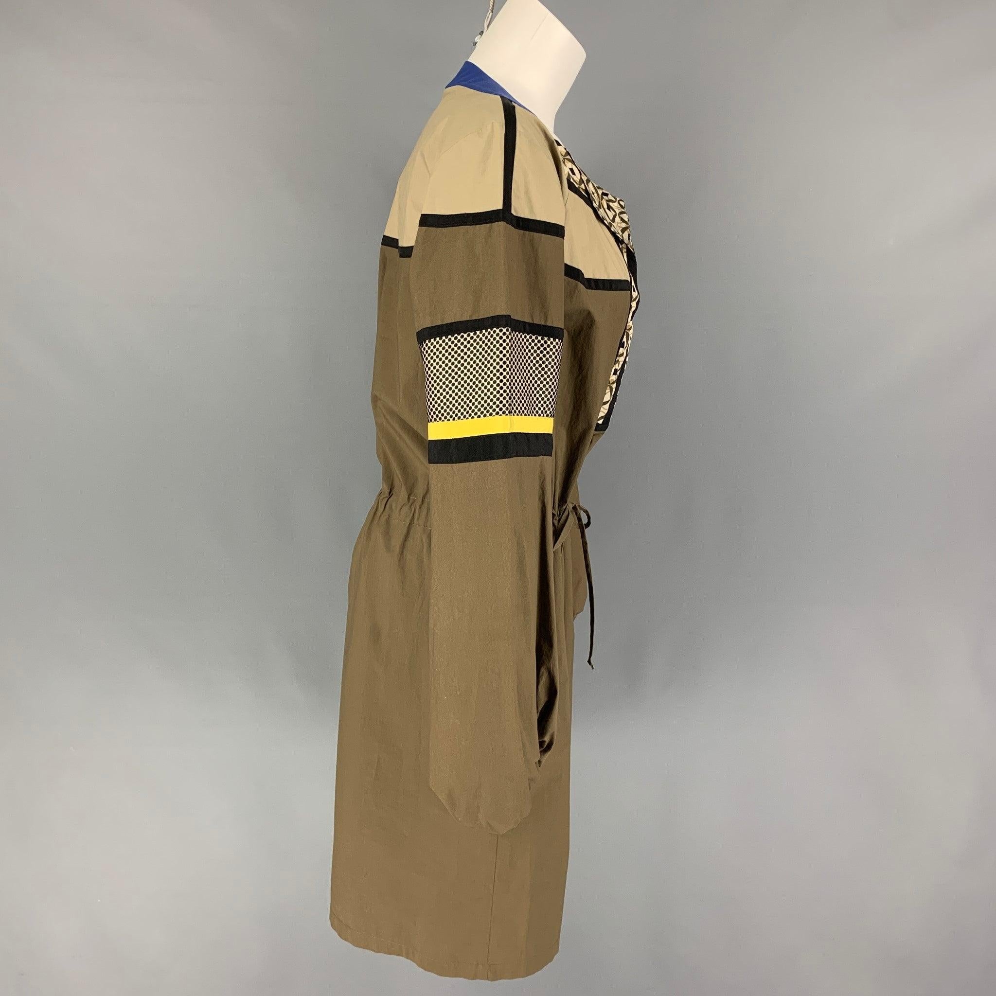 ETRO dress comes in a taupe & black cotton blend with mixed patterns featuring a waist drawstring, elastic hem, and a v-neck. Made in Italy.
Very Good
Pre-Owned Condition. Light
wear. As-Is.  

Marked:   48 

Measurements: 
 
Shoulder: 16.5 inches 