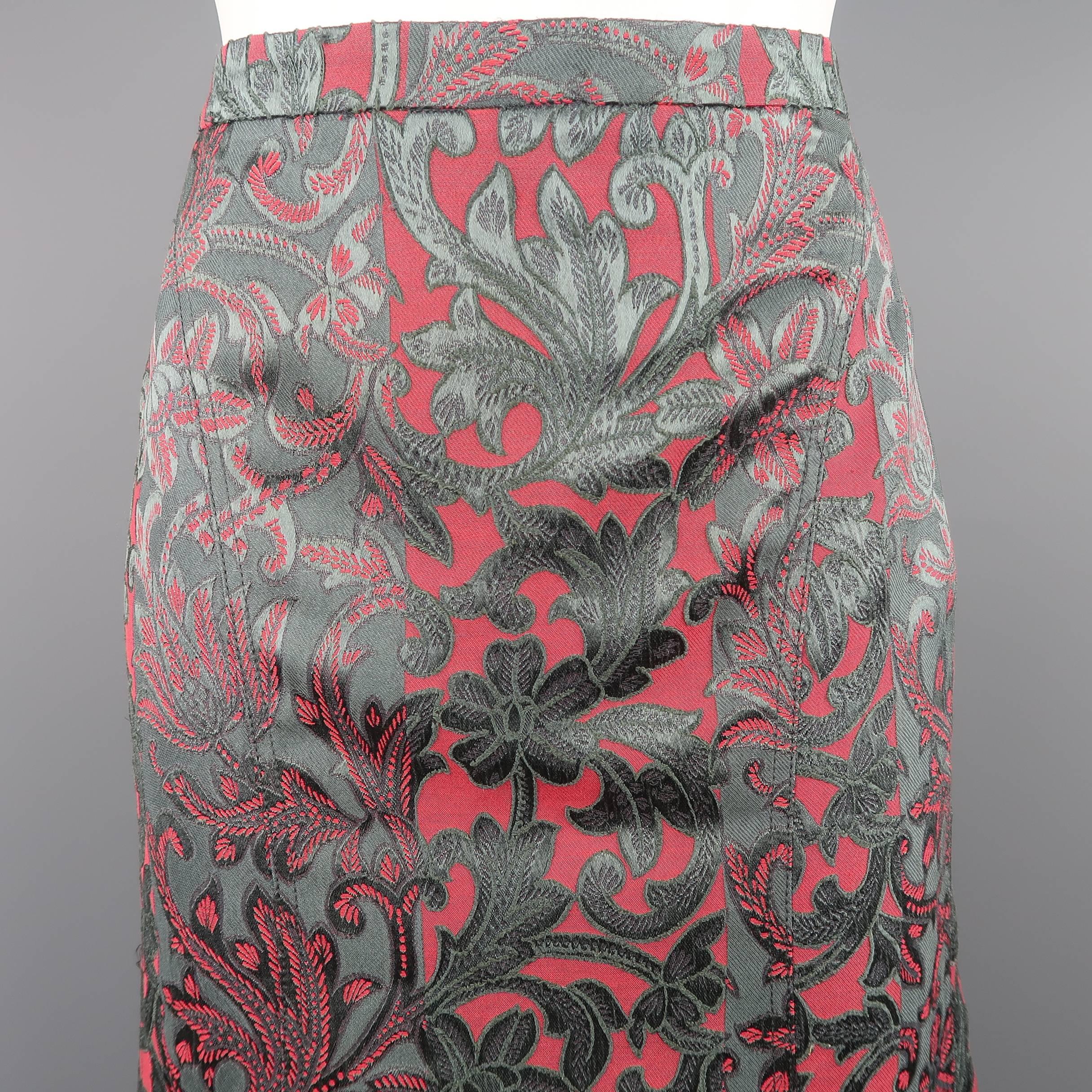 ETRO A line skirt comes in a muted burgundy and teal gray floral paisley jacquard with a fitted silhouette and ruffled fishtail back. Made in Italy.
 
Good Pre-Owned Condition.
Marked: IT 44 (Runs Small)
 
Measurements:
 
Waist: 31 in.
Hip: 38