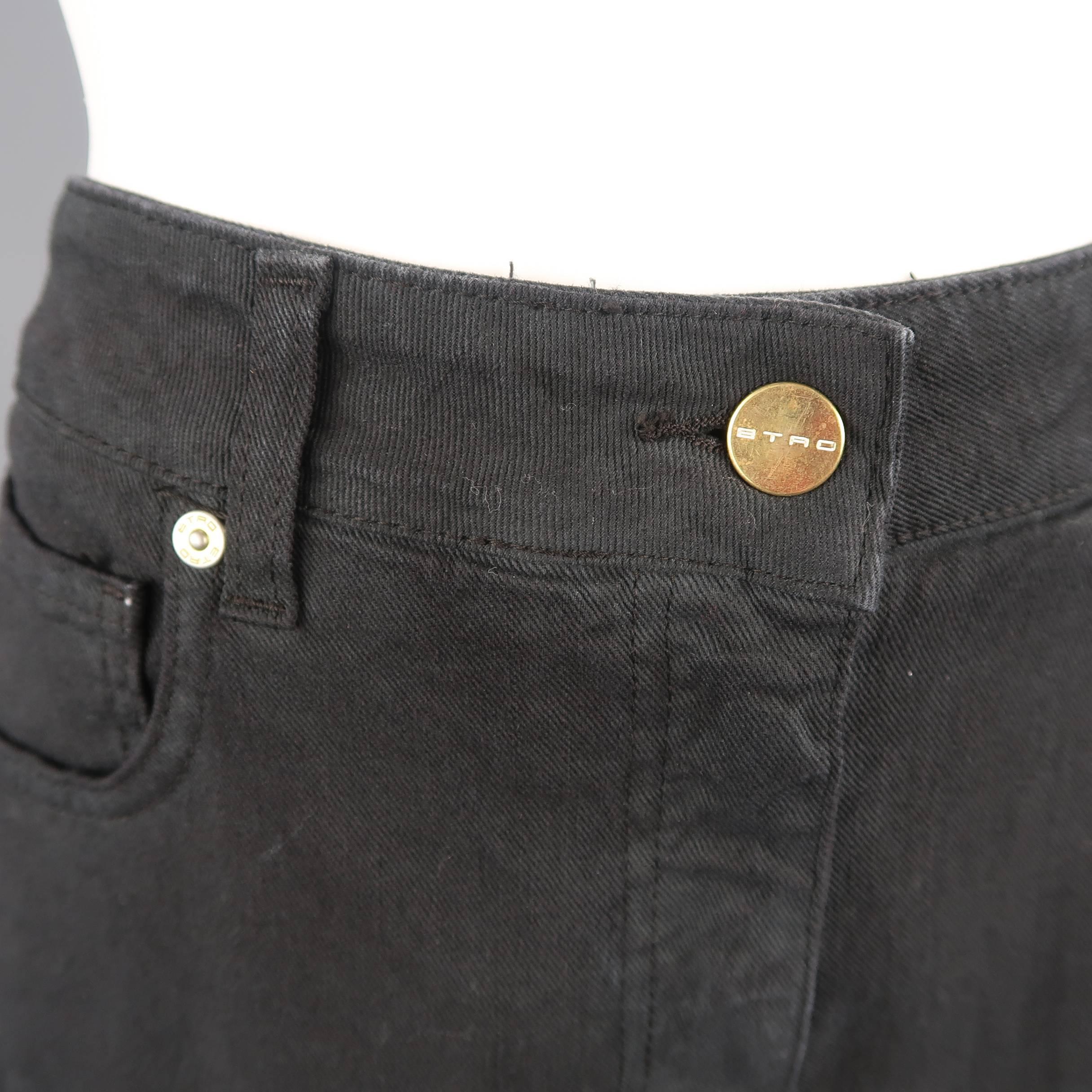 ETRO jeans come in a black cotton blend stretch denim twill with gold tone hardware, slim boot cut fit, frayed hem, and floral print stripe sides. Made  in Italy.
 
New with Tags.
Marked: 29
 
Measurements:
 
Waist: 31 in.
Rise: 10.5 in.
Inseam: 33