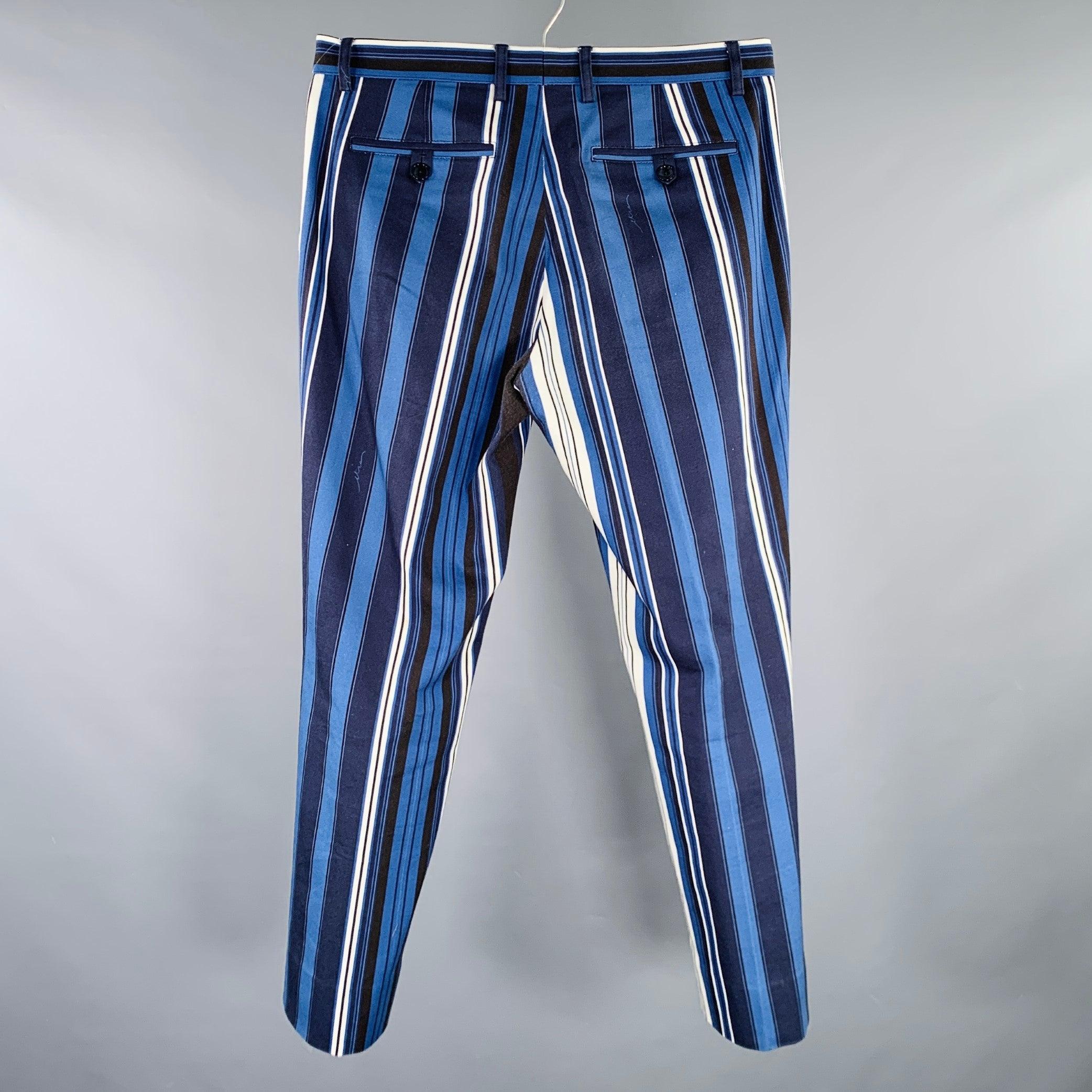 ETRO casual pants
in a blue, black, and white cotton stretch blend woven fabric featuring a stripe pattern, flat front style, and zip fly closure. Made in Italy.Excellent Pre-Owned Condition. 

Marked:   IT 48 

Measurements: 
  Waist: 32 inches
