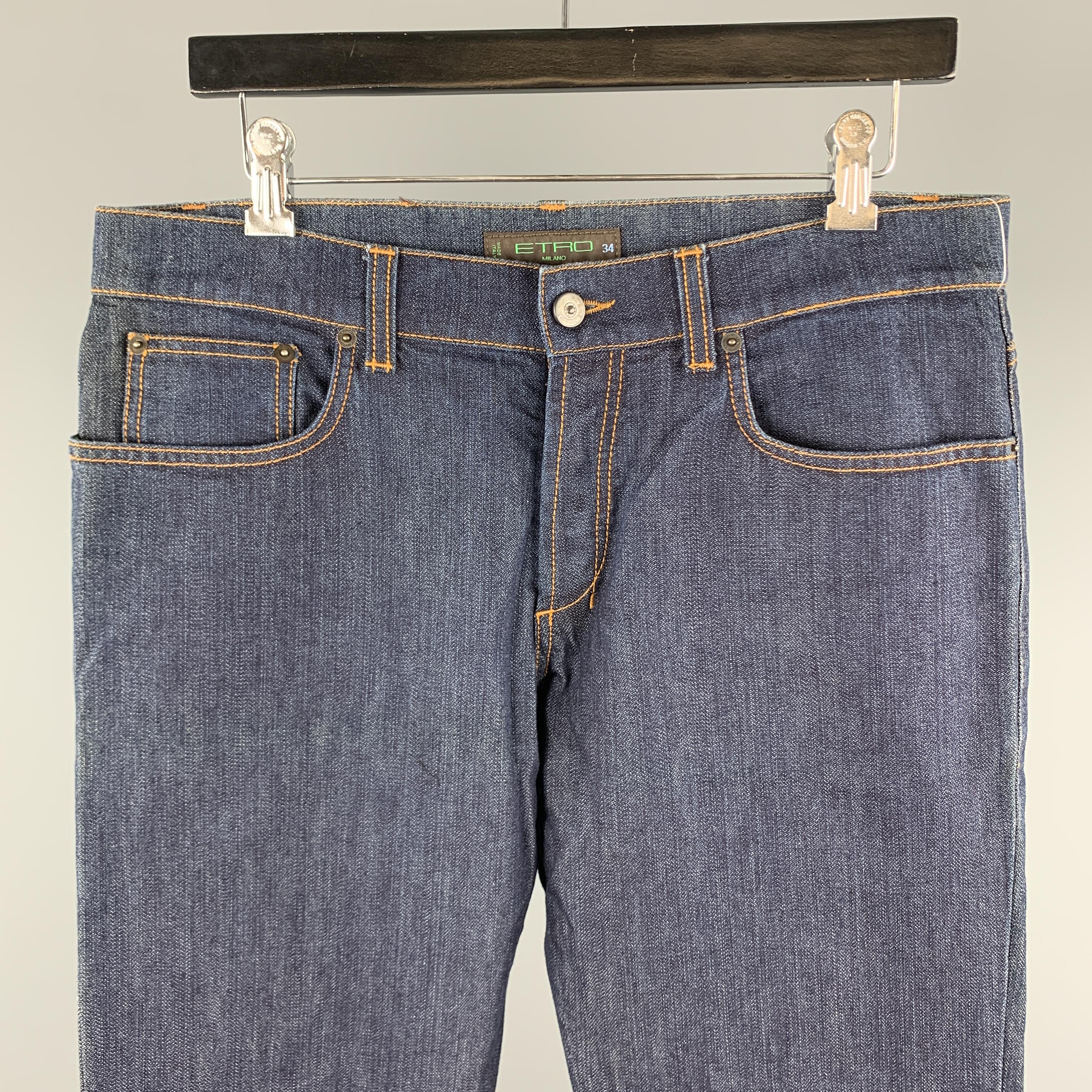 ETRO jeans comes in a indigo denim featuring contrast stitching details and a button fly closure. Made in Italy.
 

Excellent Pre-Owned Condition.
Marked: 34

Measurements:

Waist: 34 in. 
Rise: 9 in. 
Inseam: 34 in. 