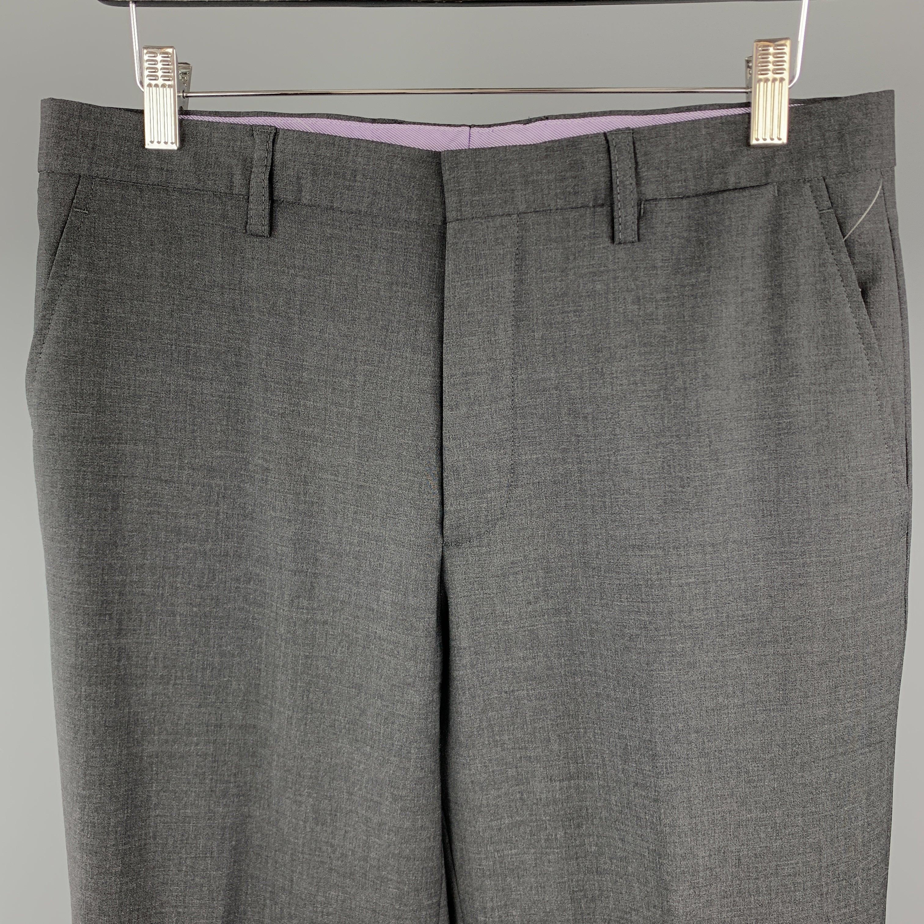 ETRO
dress pants comes in a solid gray lana wool material, featuring a flat front style, zip fly, and seam and slit pockets. Made in Italy.Excellent Pre-Owned Condition. 

Marked:   IT 50 

Measurements: 
  Waist: 34 inches 
Rise: 10.5 inches