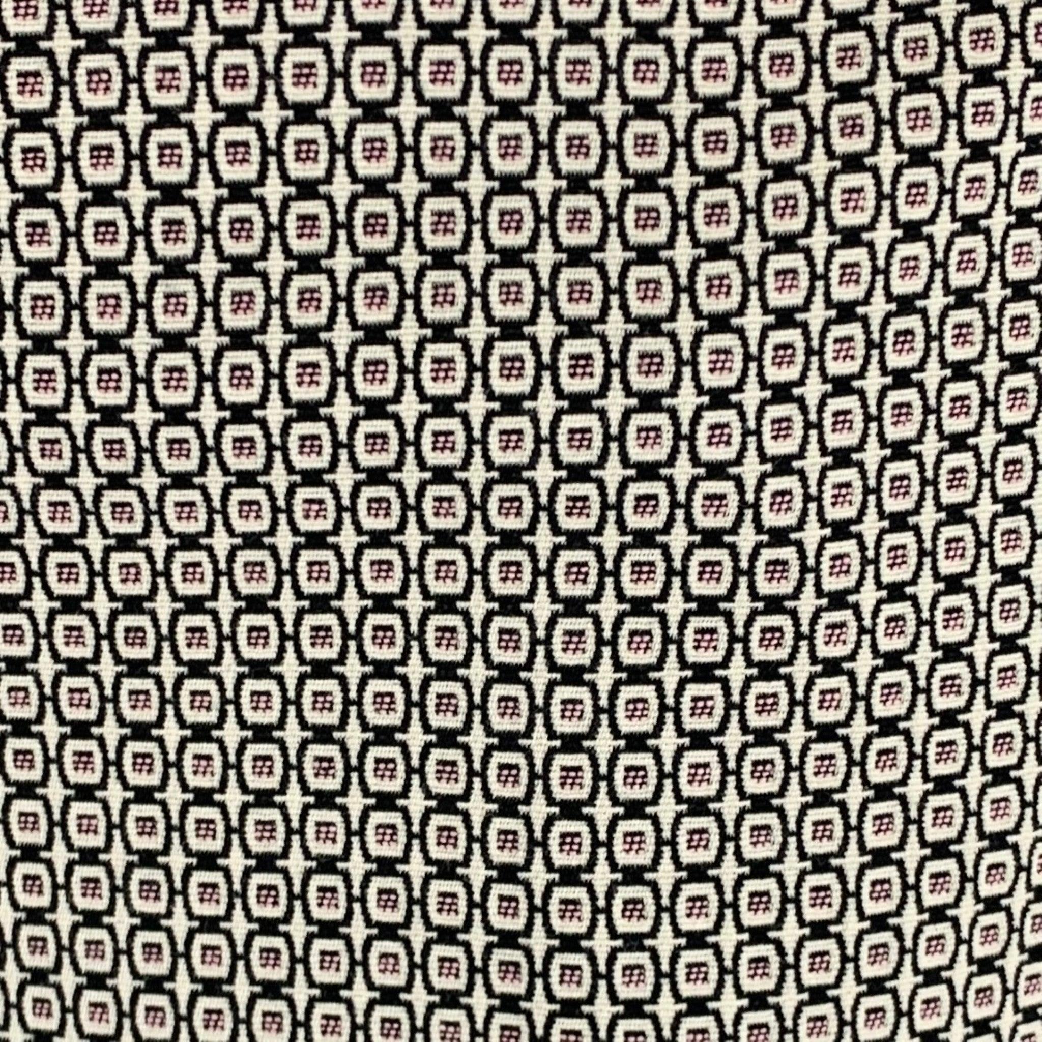 ETRO dress pants
in a
beige and black cotton blend fabric featuring jacquard squares pattern, flat front style, and zip fly closure. Made in Italy.Excellent Pre-Owned Condition. 

Marked:   40 

Measurements: 
  Waist: 30 inches Rise: 8 inches